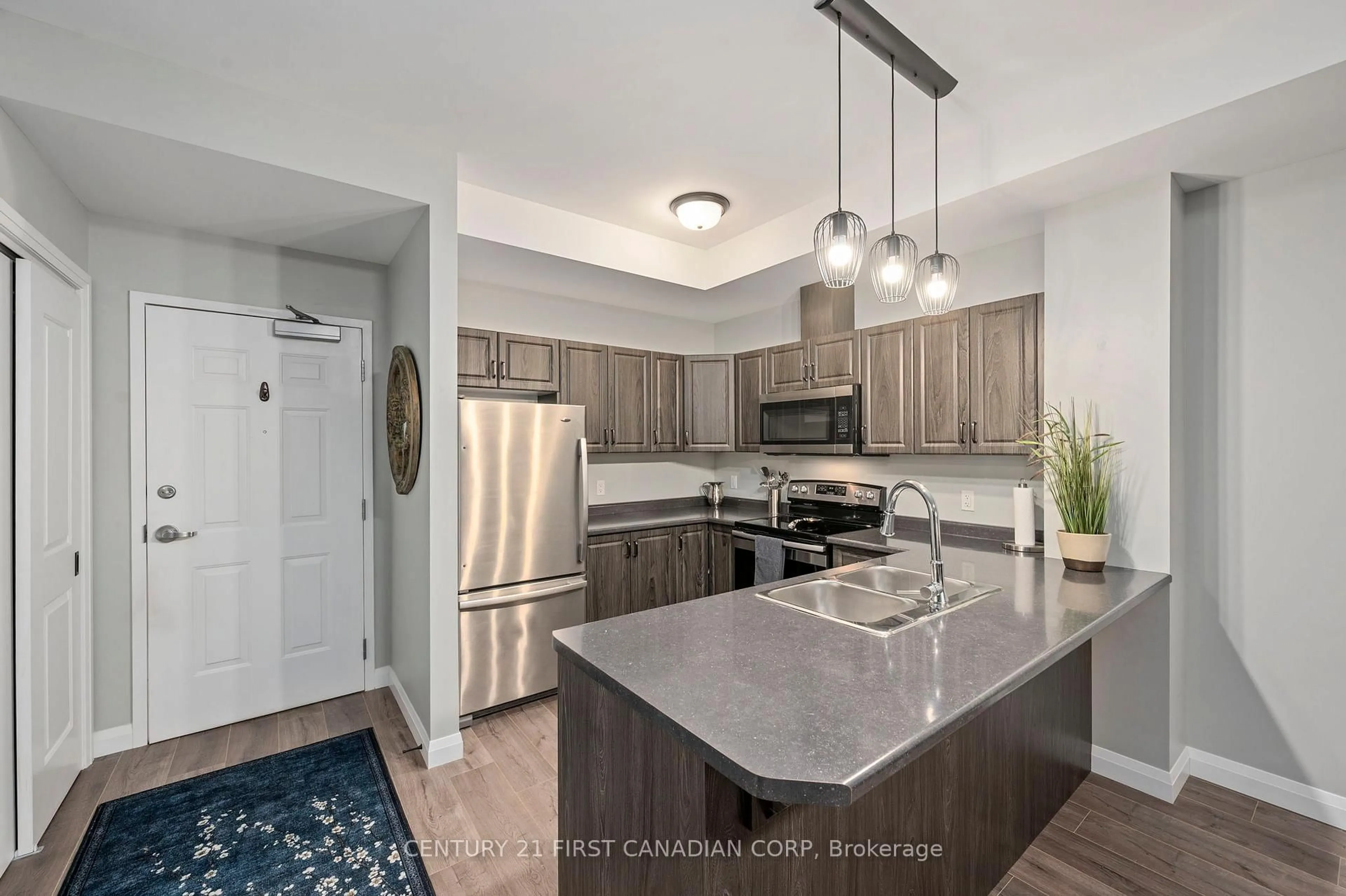 Open concept kitchen, unknown for 263 Butler St #205, Lucan Biddulph Ontario N0M 2J0