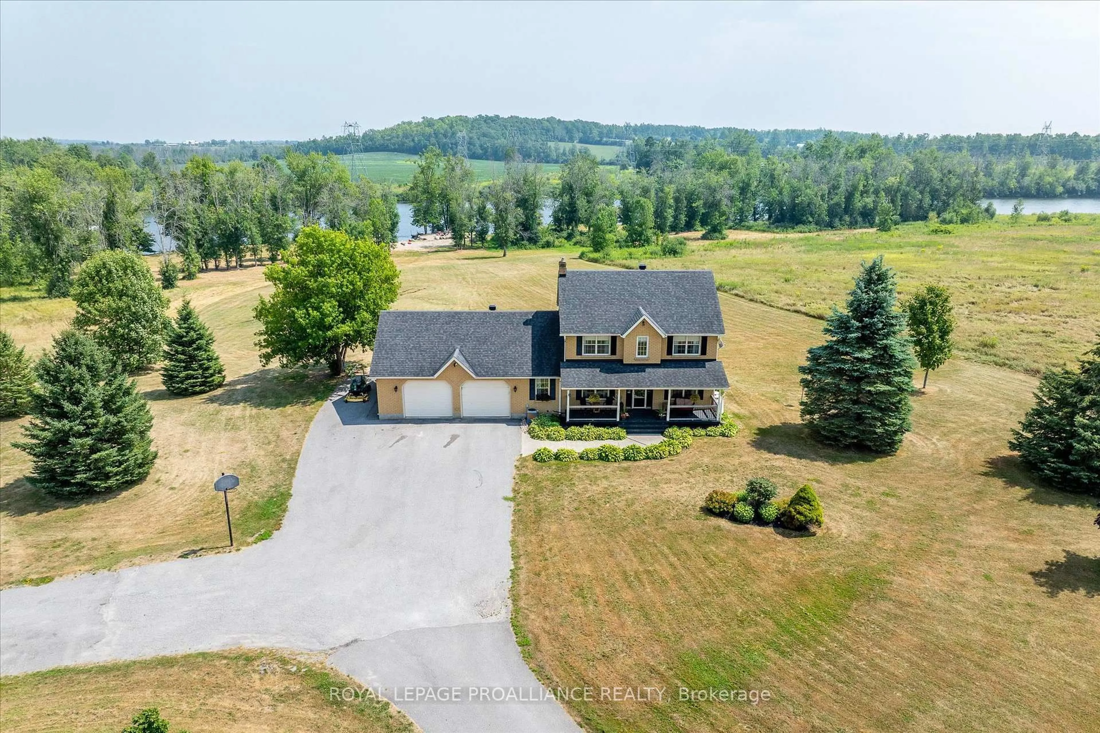 A pic from outside/outdoor area/front of a property/back of a property/a pic from drone, water/lake/river/ocean view for 1787 Moncrief Line, Cavan Monaghan Ontario K9J 6Z9