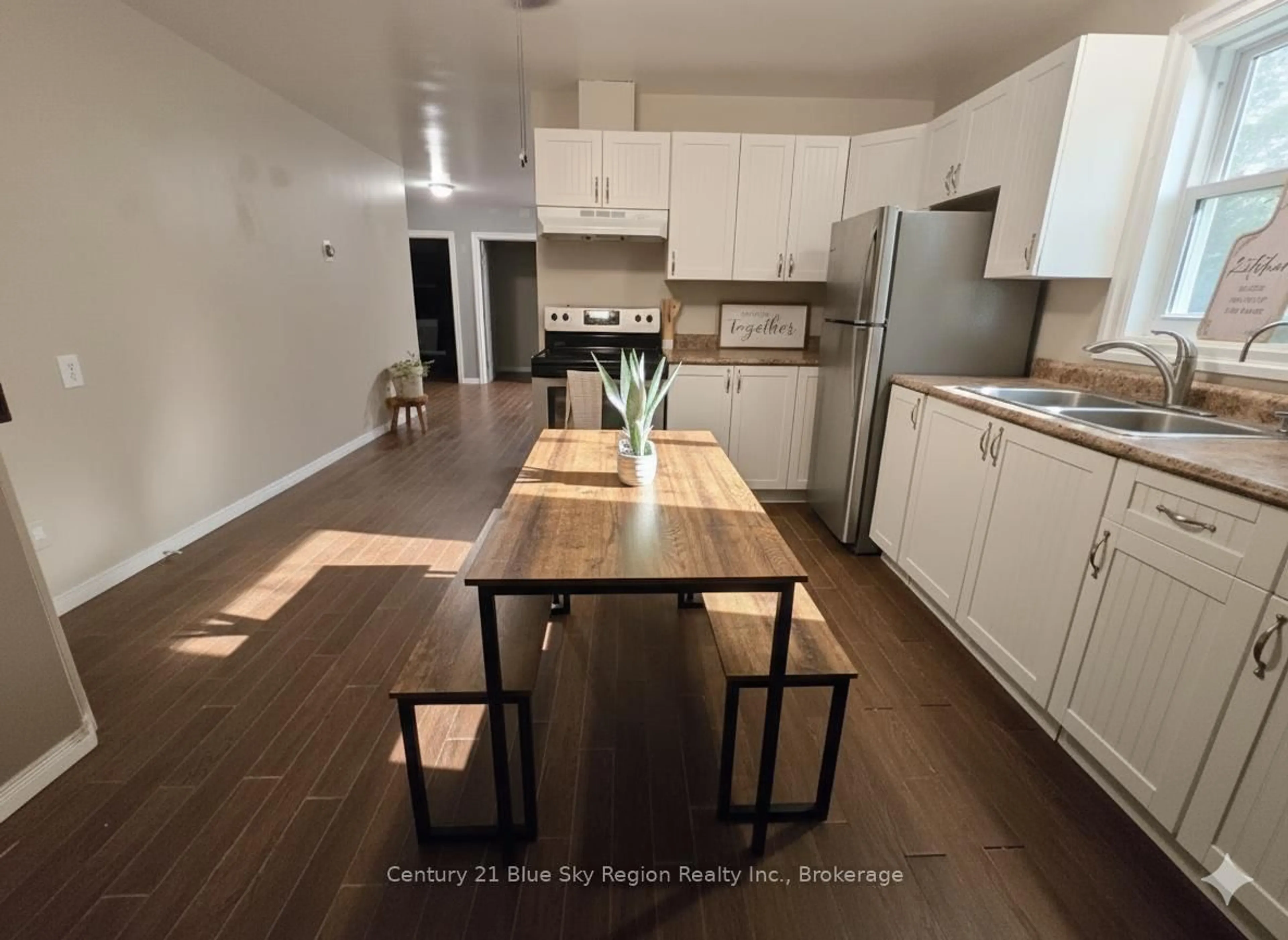 Open concept kitchen, wood/laminate floor for 781 Lalande Rd, West Nipissing Ontario P2B 2V3