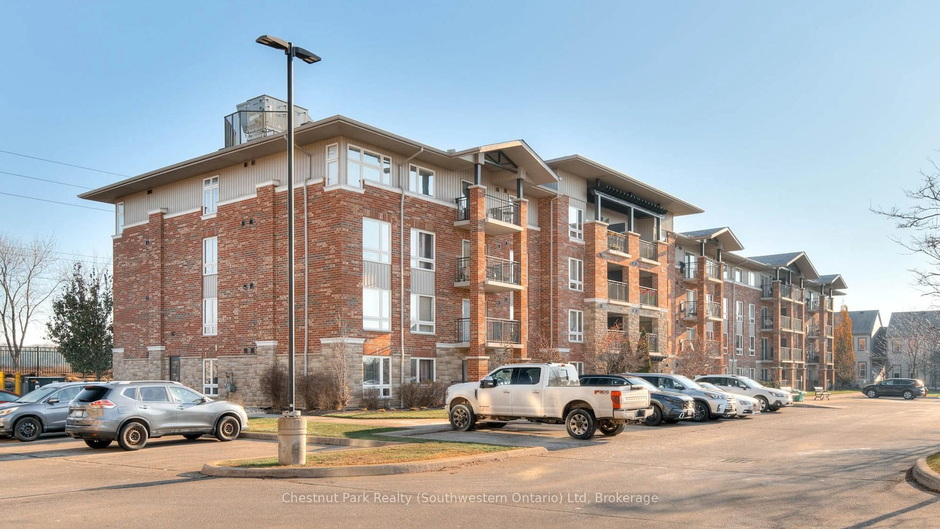 Home with brick exterior material, building for 19 Waterford Dr #103, Guelph Ontario N1L 0G8