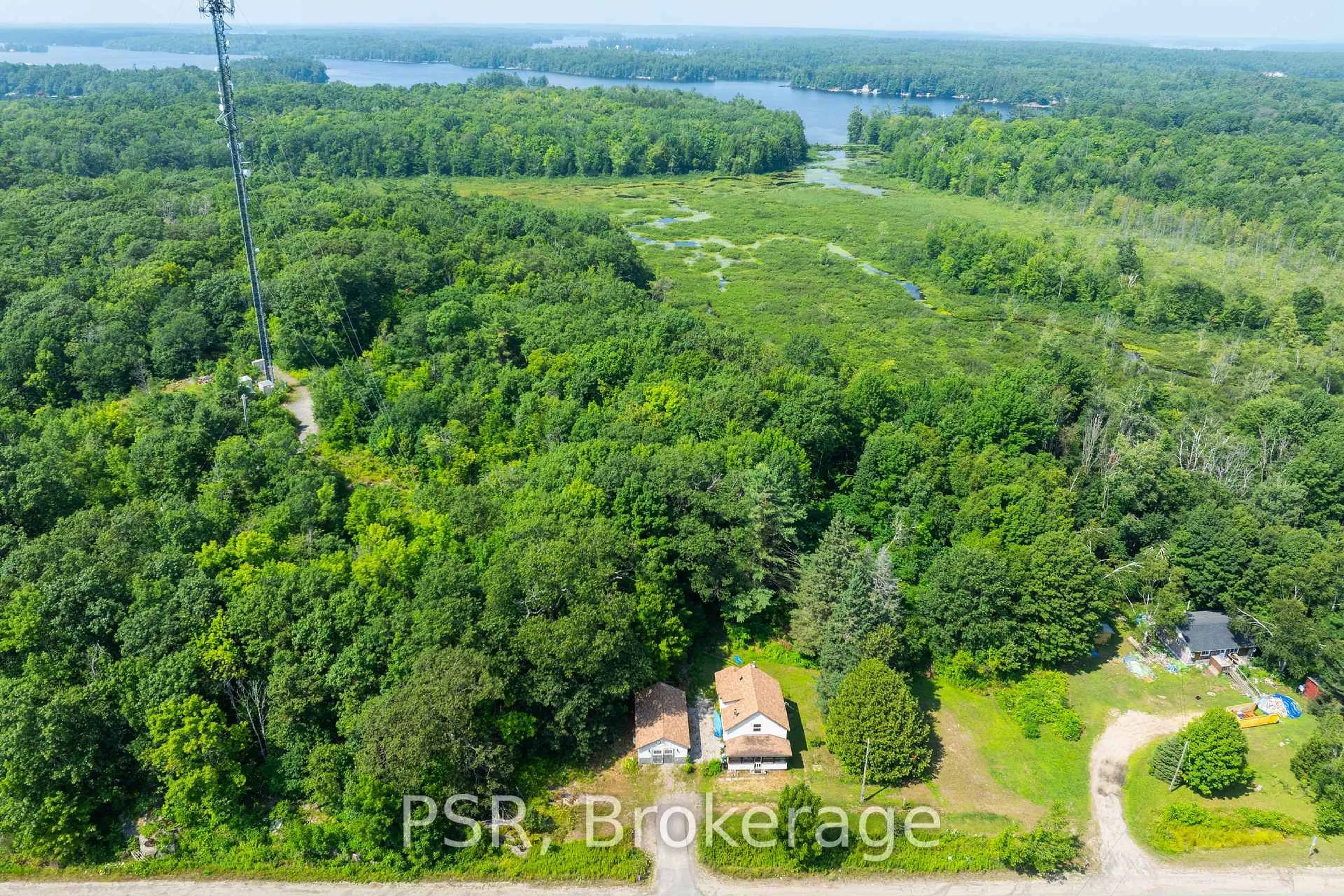 A pic from outside/outdoor area/front of a property/back of a property/a pic from drone, water/lake/river/ocean view for 2676 Muskoka District 169 Rd, Muskoka Lakes Ontario P0C 1M0
