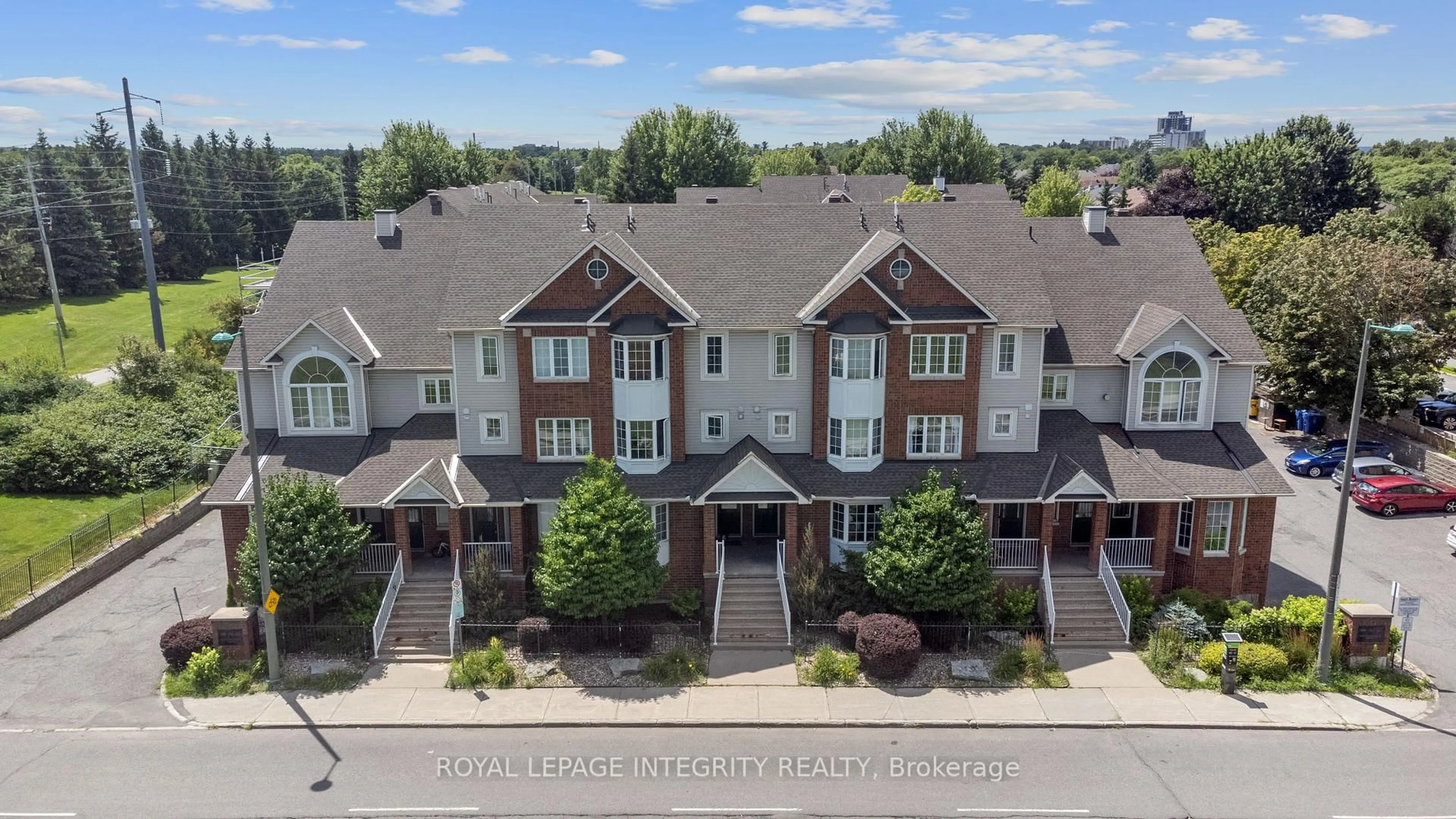 A pic from outside/outdoor area/front of a property/back of a property/a pic from drone, unknown for 108 Centrepointe Dr #E, Ottawa Ontario K2G 6K3