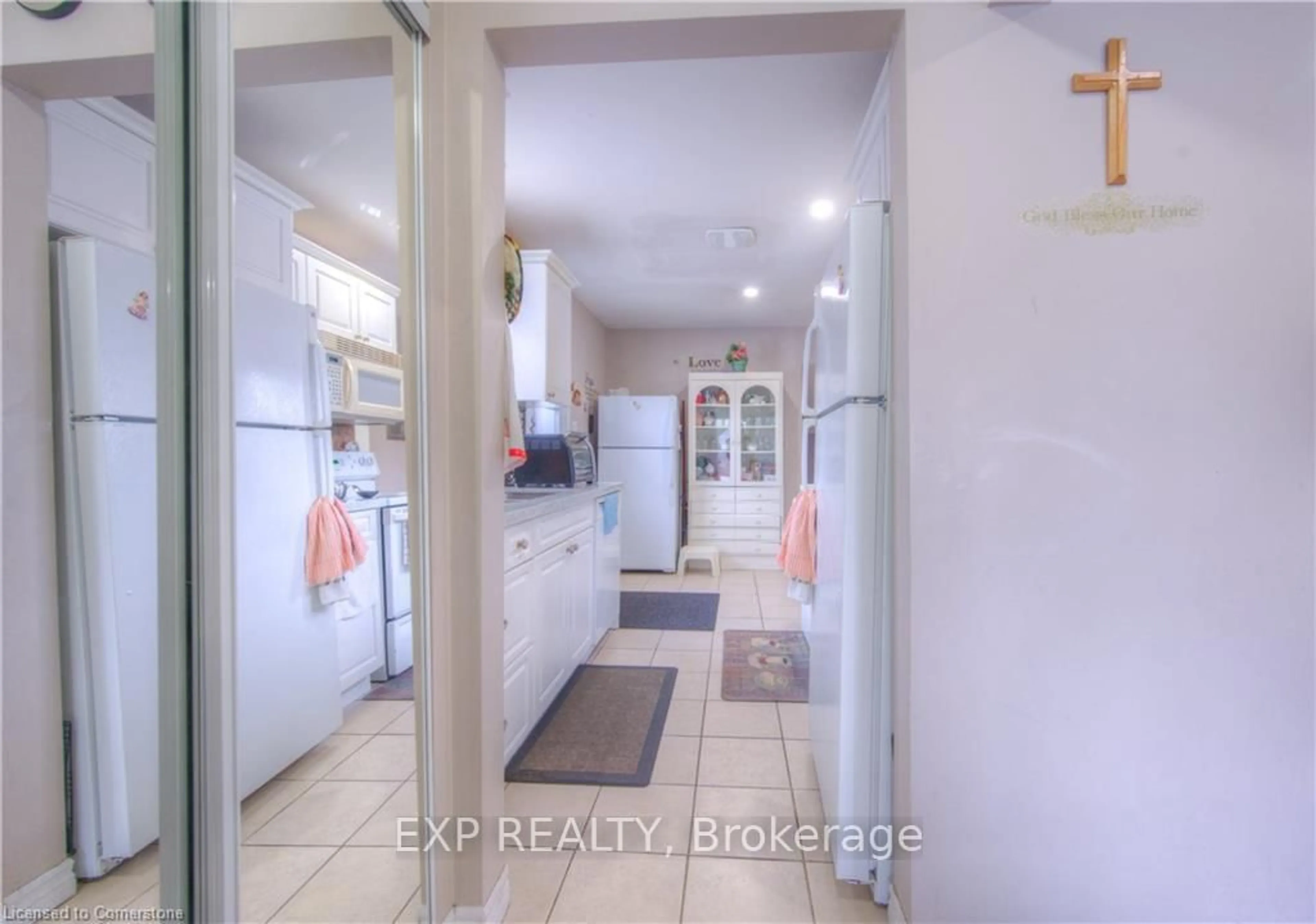 Kitchen with laundary machines, ceramic/tile floor for 74 Markwood Dr, Kitchener Ontario N2M 2H6