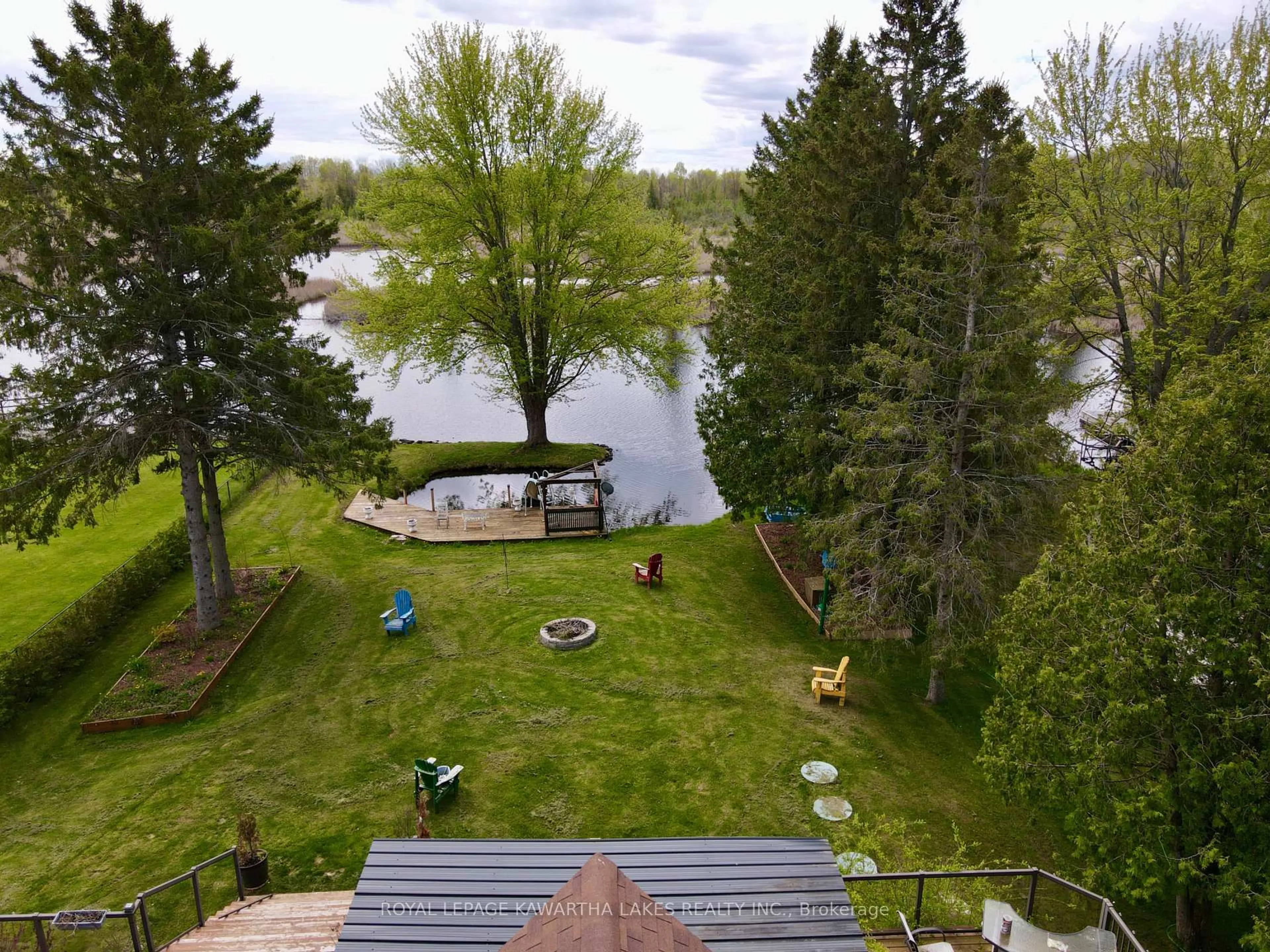 A pic from outside/outdoor area/front of a property/back of a property/a pic from drone, water/lake/river/ocean view for 21 Trent View Rd, Kawartha Lakes Ontario K0M 2B0