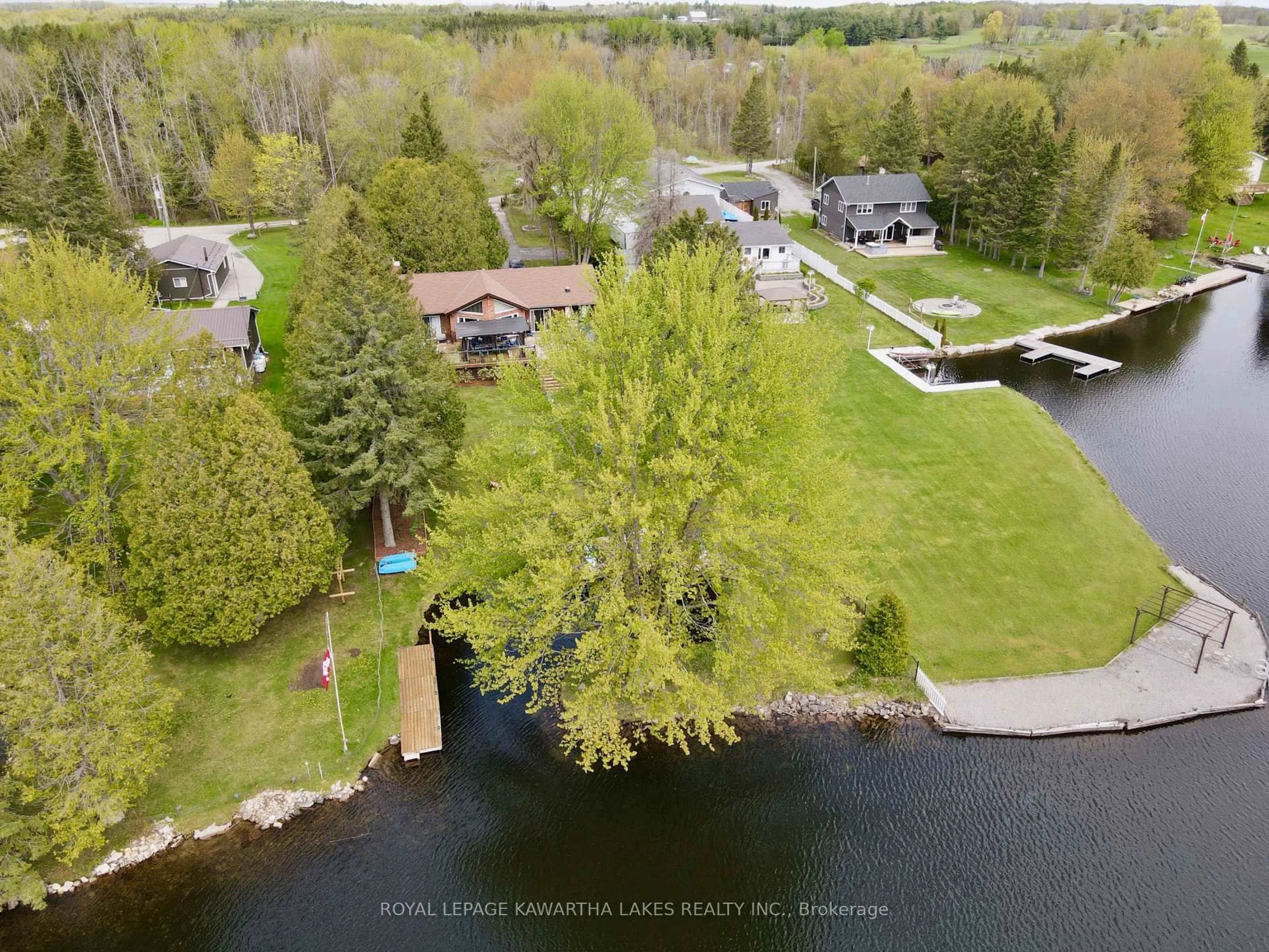 A pic from outside/outdoor area/front of a property/back of a property/a pic from drone, water/lake/river/ocean view for 21 Trent View Rd, Kawartha Lakes Ontario K0M 2B0