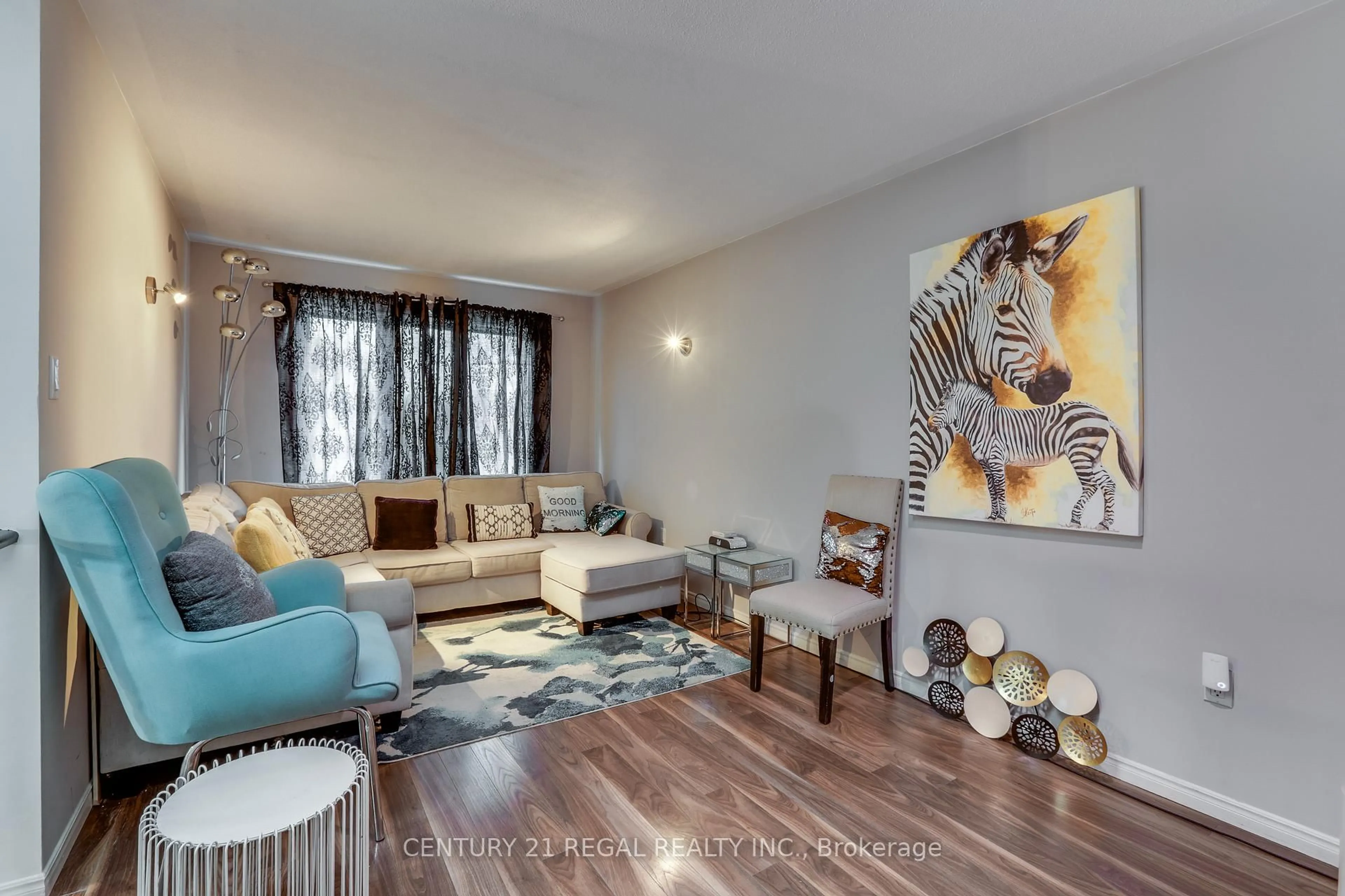 Living room with furniture, wood/laminate floor for 79 SUNRISE Cres, London East Ontario N5V 4V8