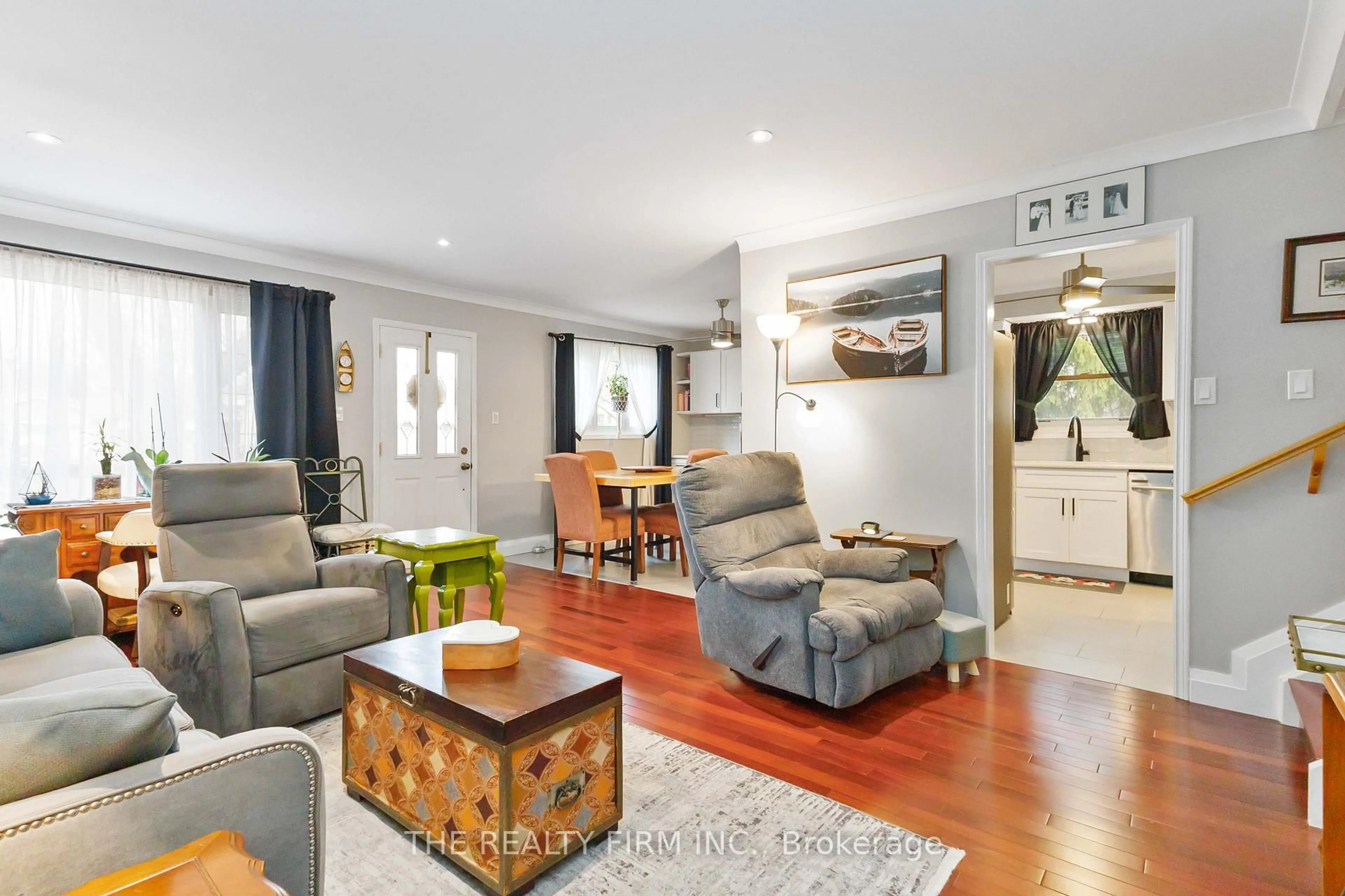 Living room with furniture, wood/laminate floor for 72 Metcalfe Cres, London South Ontario N6E 1H9