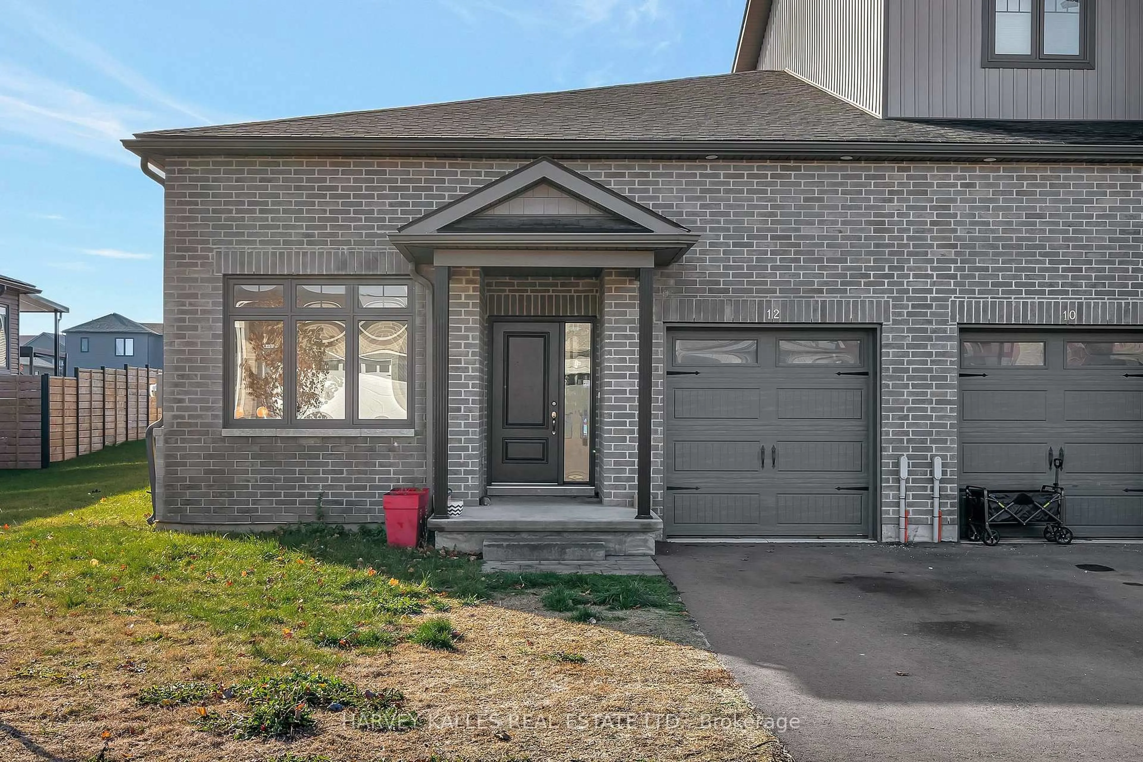 Home with brick exterior material, street for 12 Allen St, Prince Edward County Ontario K0K 2T0