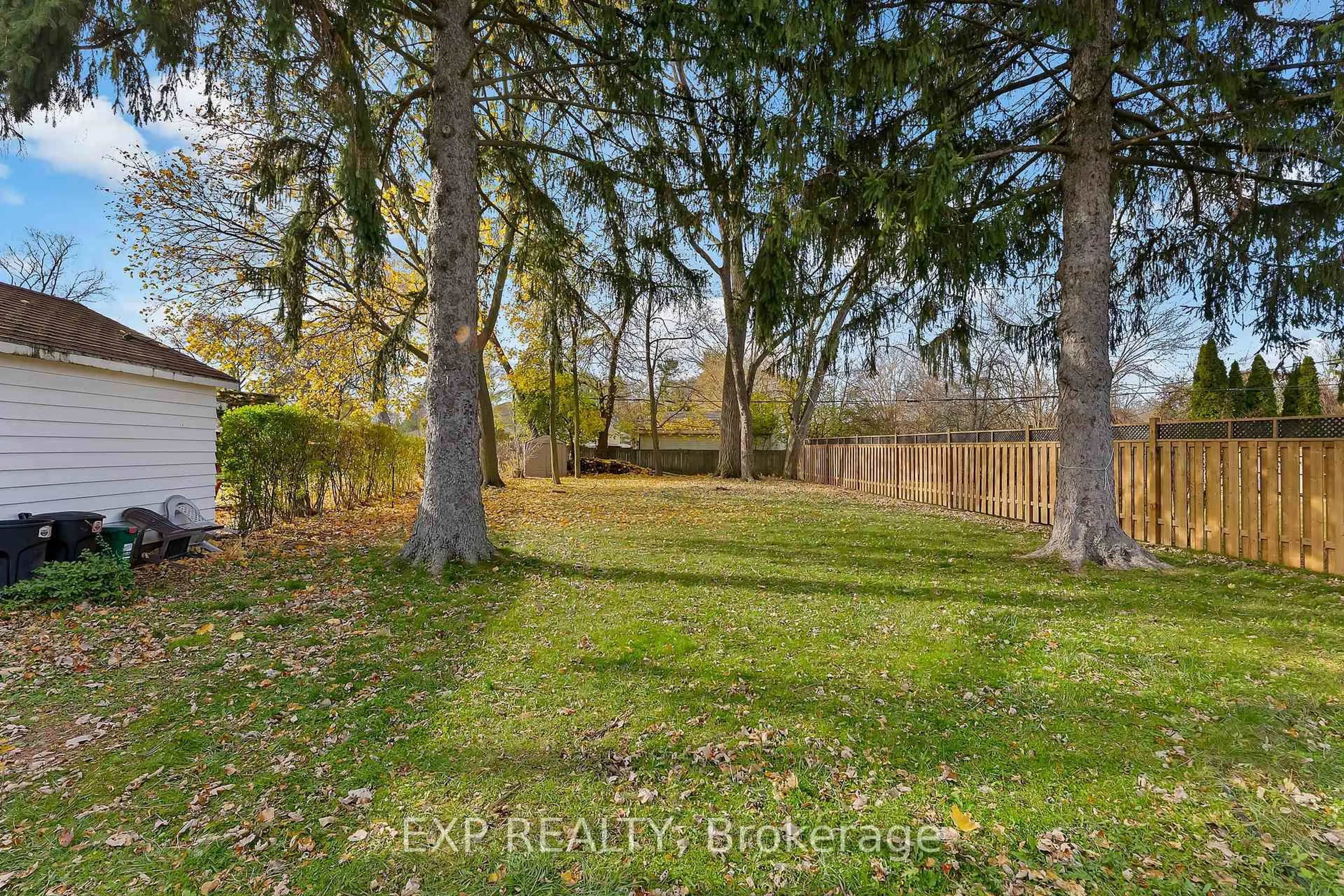 A pic from outside/outdoor area/front of a property/back of a property/a pic from drone, forest/trees view for 6 Hallcrest Ave, St. Catharines Ontario L2N 1V5