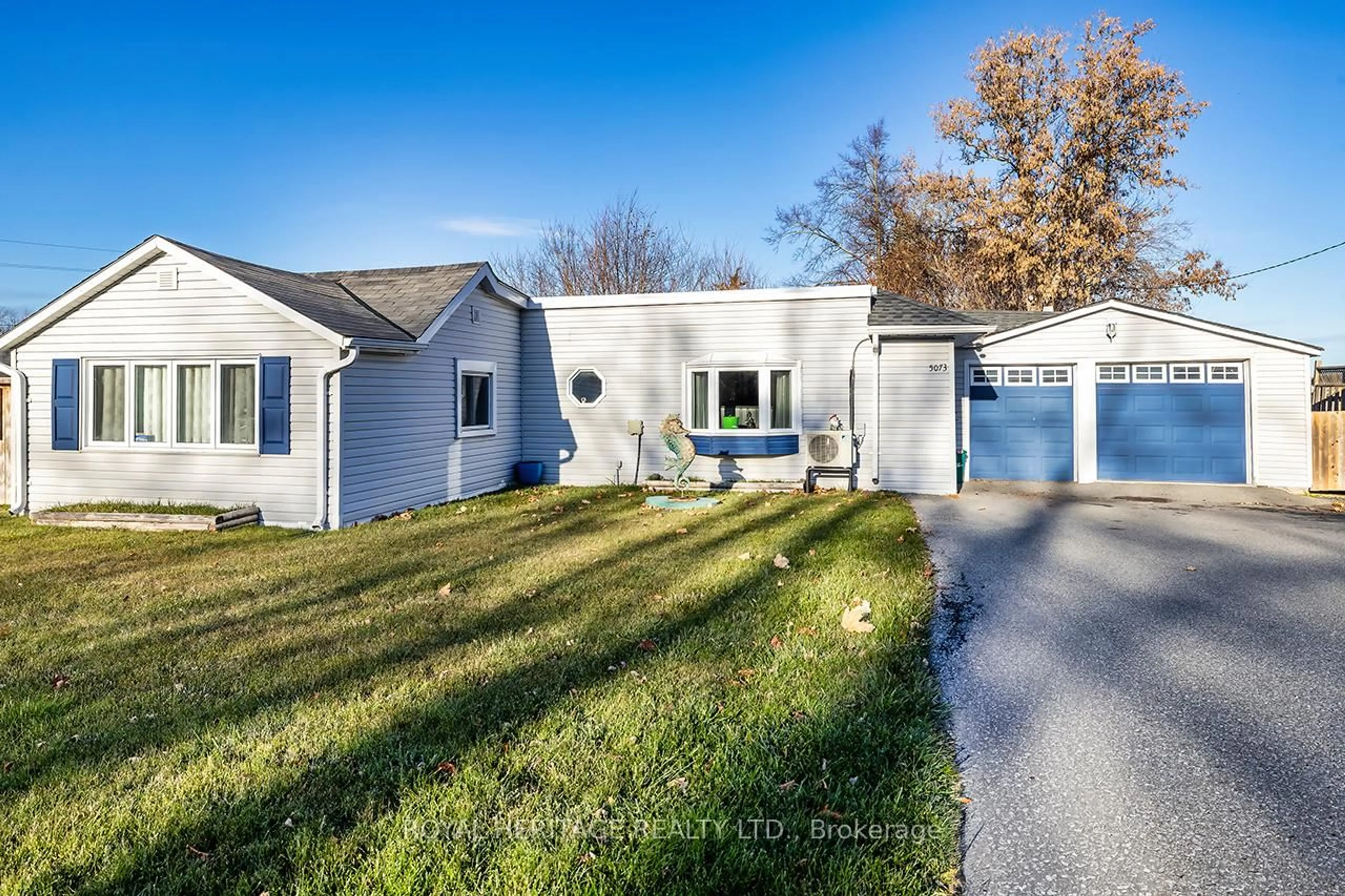 Home with vinyl exterior material, street for 5073 Oak St, Hamilton Township Ontario K0L 1E0