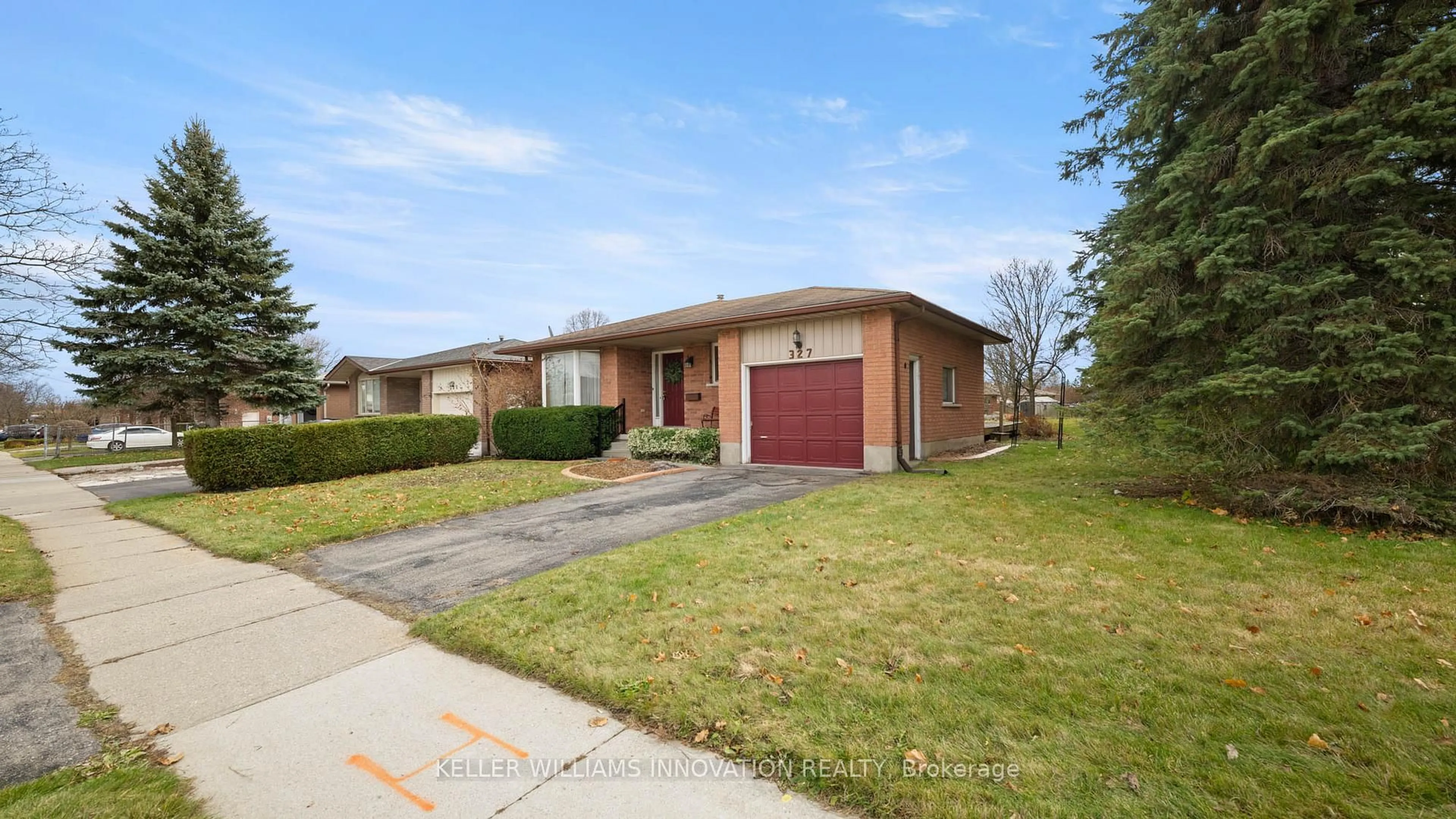 Home with brick exterior material, street for 327 Conservation Dr, Waterloo Ontario N2V 1V3