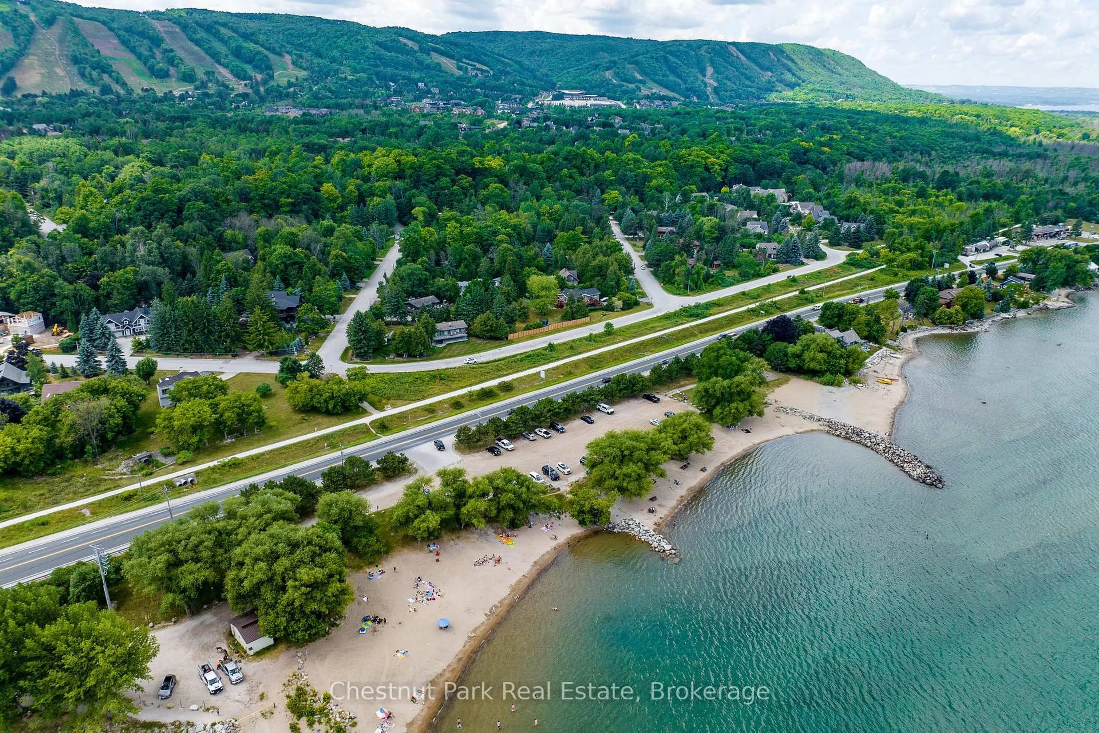 A pic from outside/outdoor area/front of a property/back of a property/a pic from drone, water/lake/river/ocean view for 146 Chamonix Cres, Blue Mountains Ontario L9Y 3Z2