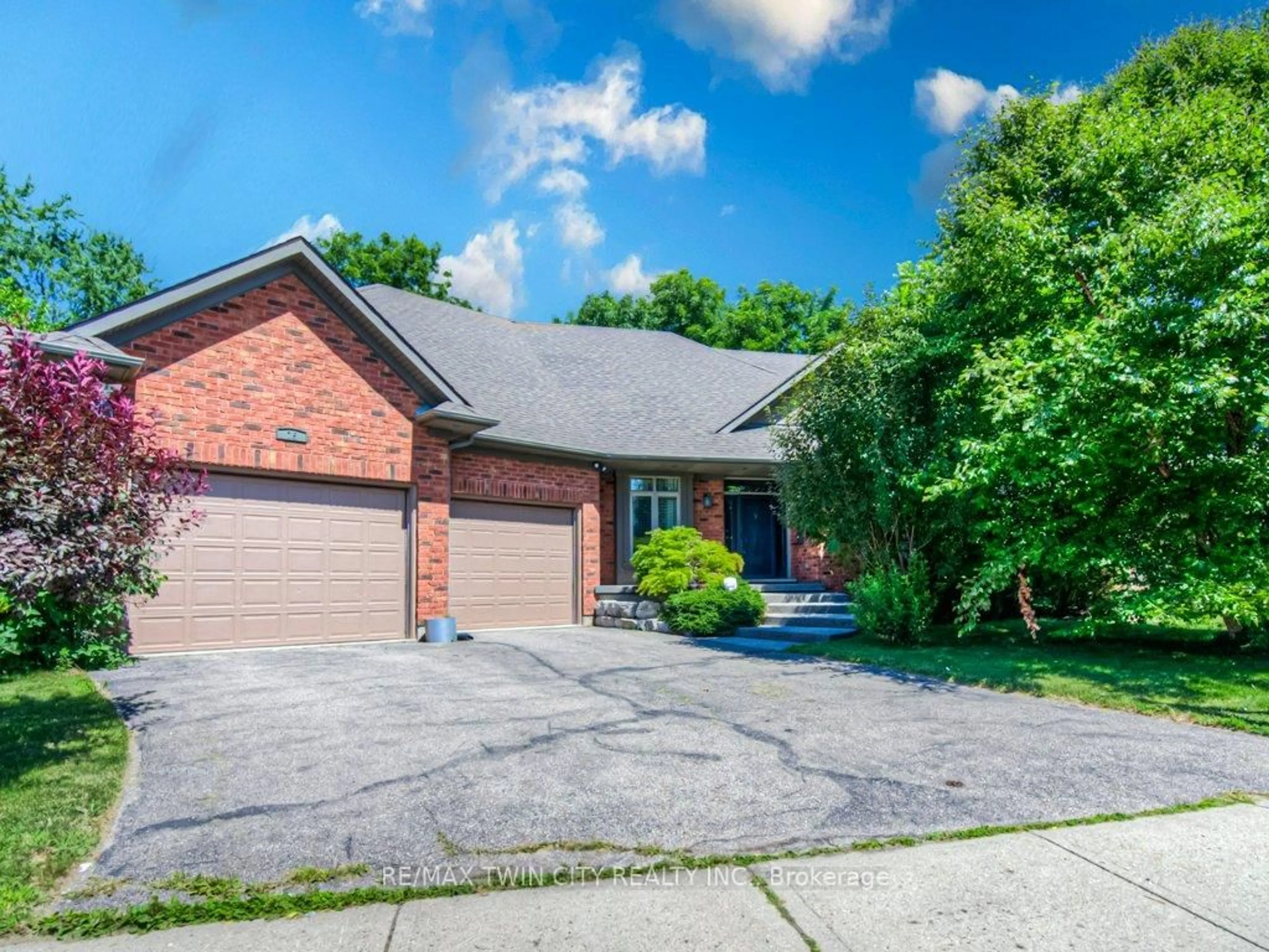 Home with brick exterior material, street for 75 Wagon St, Kitchener Ontario N2P 2V2