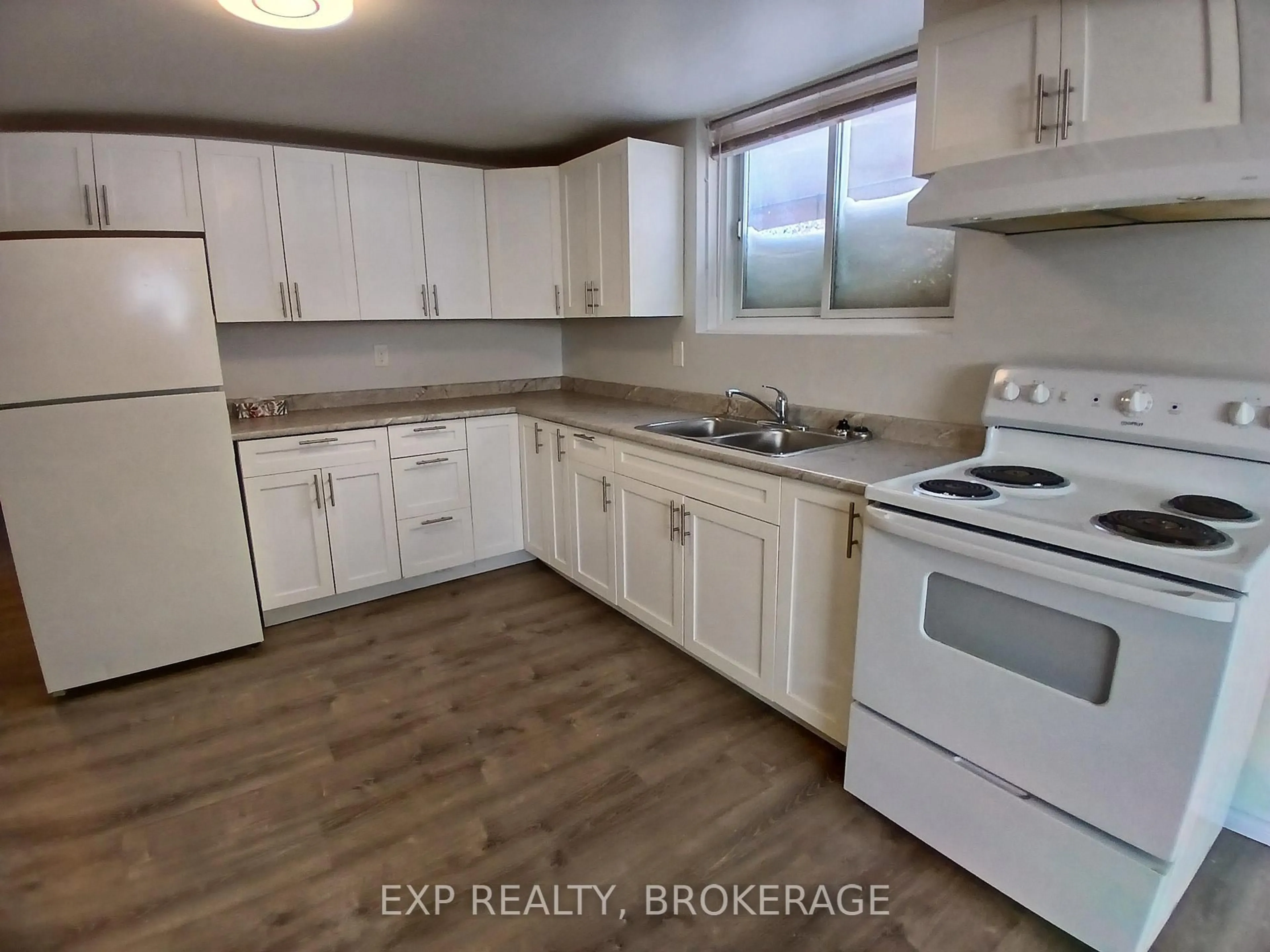 Standard kitchen, wood/laminate floor for 16 DALY St, Kingston Ontario K7K 4Y9