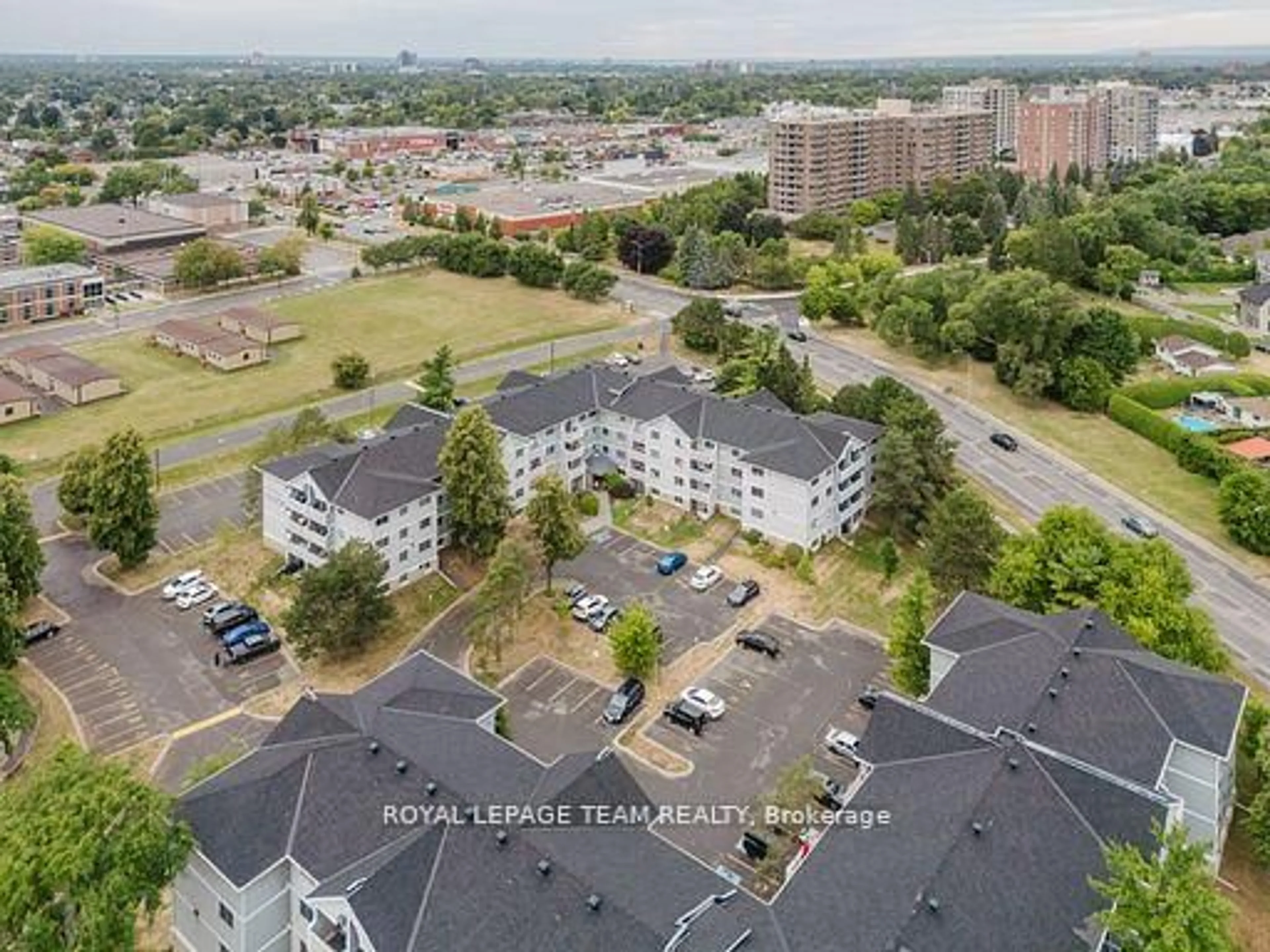 A pic from outside/outdoor area/front of a property/back of a property/a pic from drone, unknown for 212 Viewmount Dr #210, Ottawa Ontario K2E 7X2