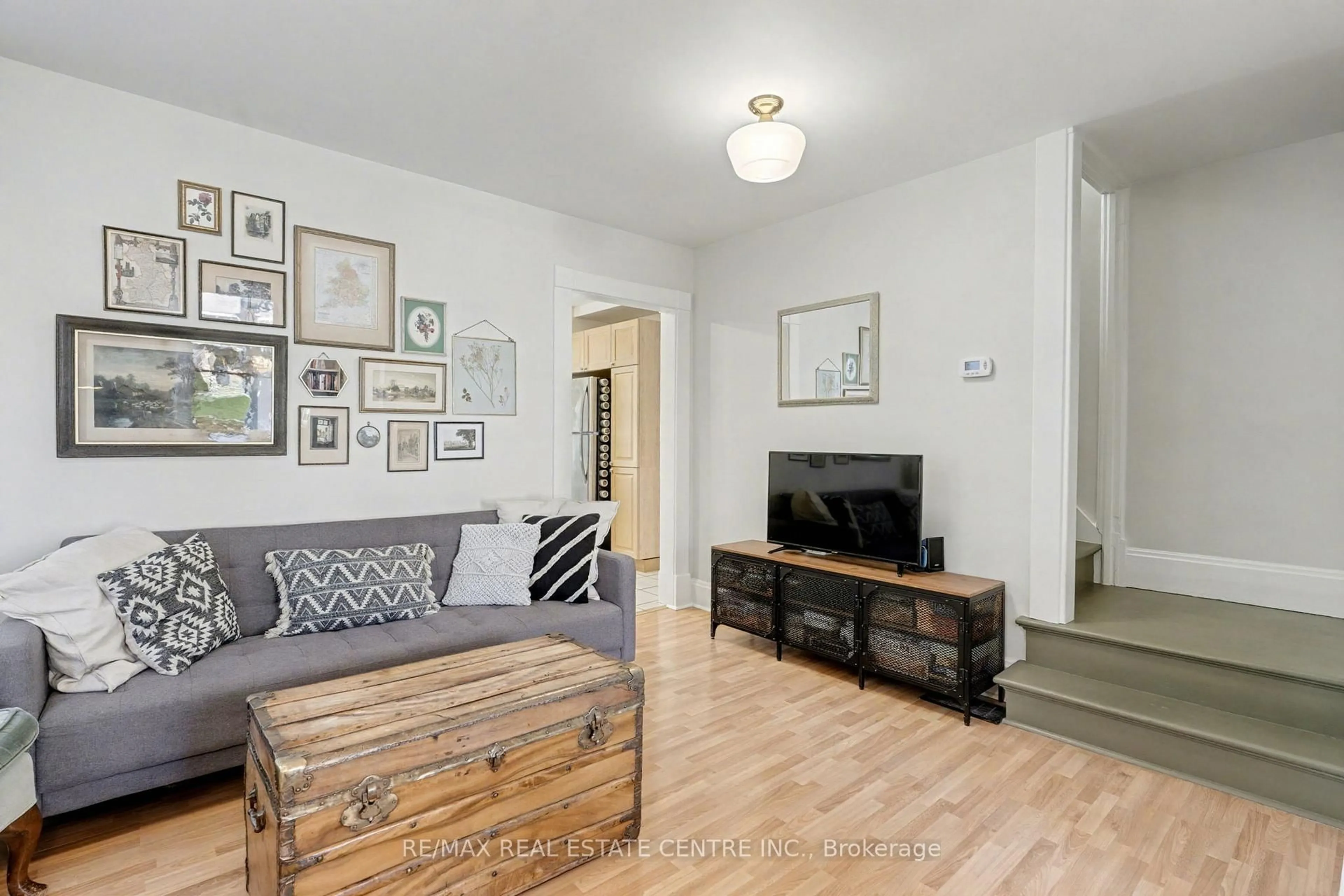 Living room with furniture, wood/laminate floor for 60 Rife Ave, Cambridge Ontario N3C 2G7