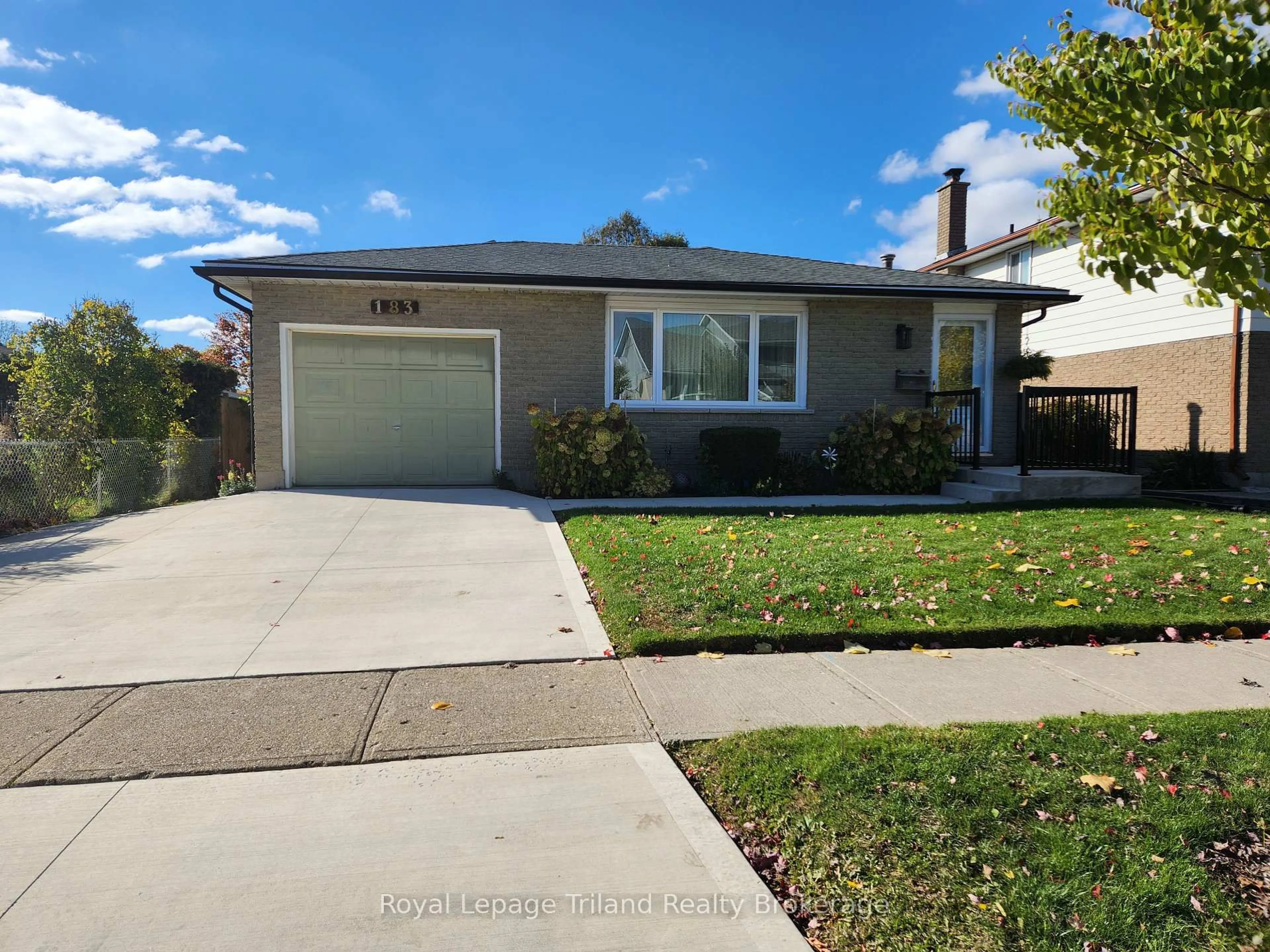 Home with vinyl exterior material, street for 183 Diefenbaker Dr, Woodstock Ontario N4S 8K1