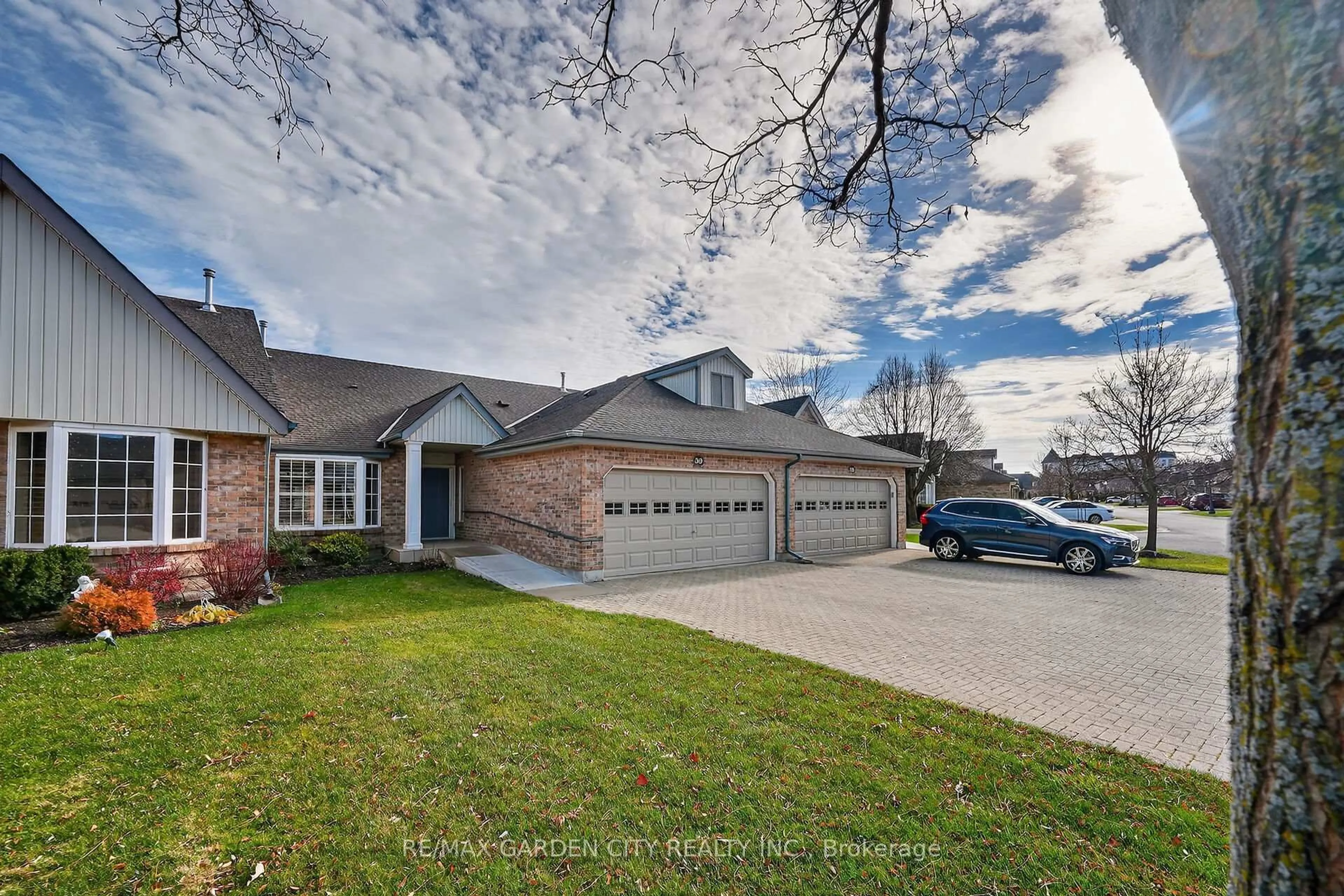 Home with brick exterior material, street for 212 Glen Morris Dr. Dr #39, St. Catharines Ontario L2T 4C5