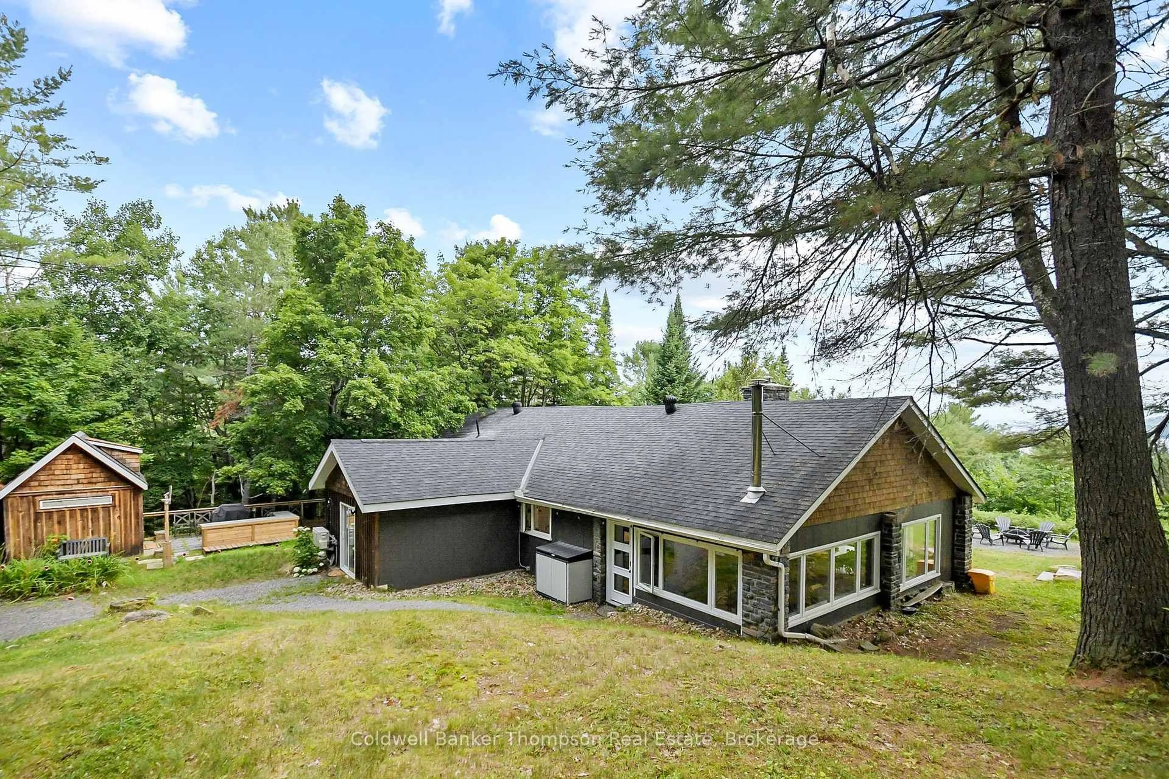 A pic from outside/outdoor area/front of a property/back of a property/a pic from drone, unknown for 179 Hoths Lane, Huntsville Ontario P0B 1L0