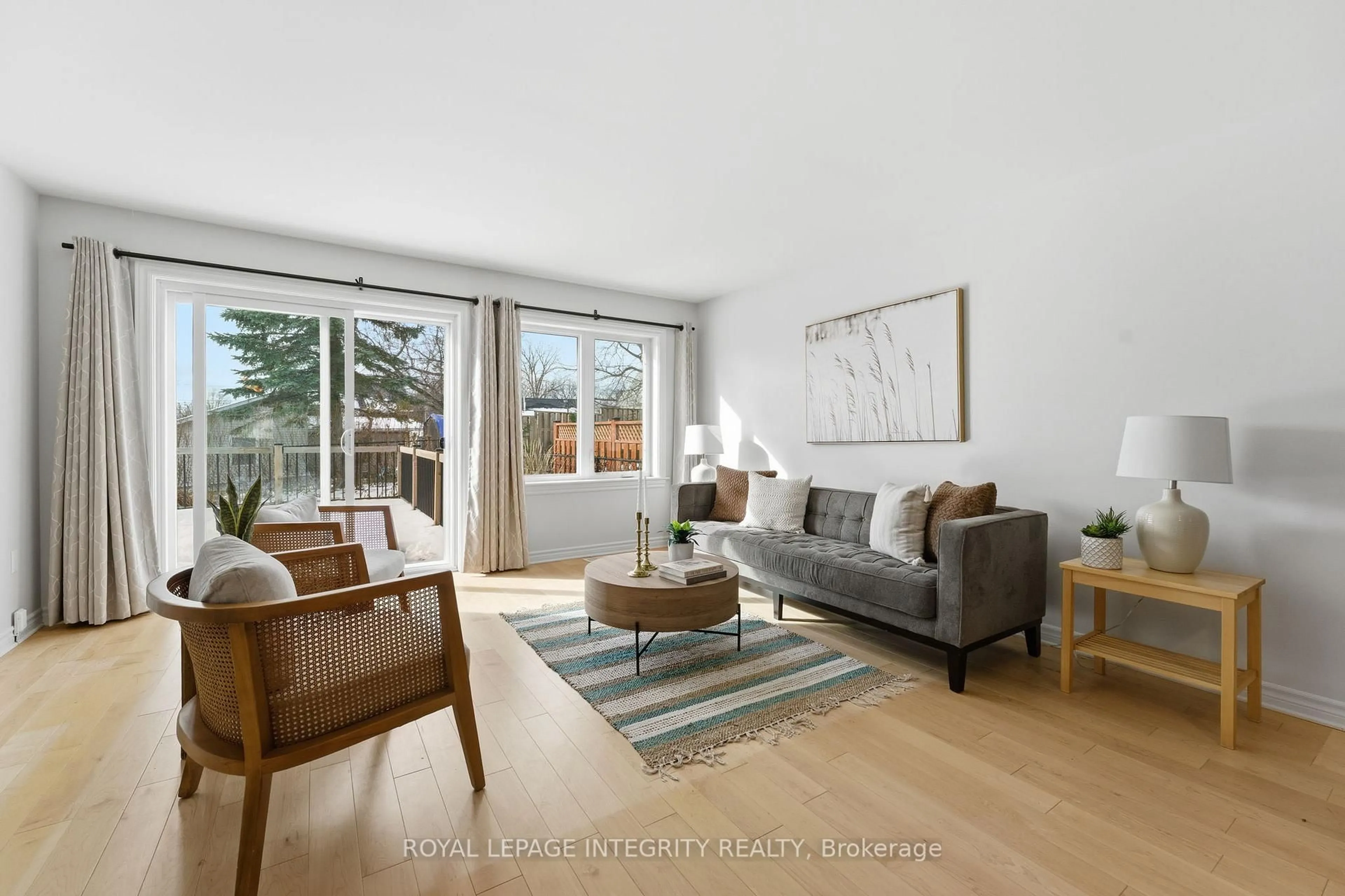 Living room with furniture, wood/laminate floor for 313 Napier Crt, Almonte Ontario K0A 1A0