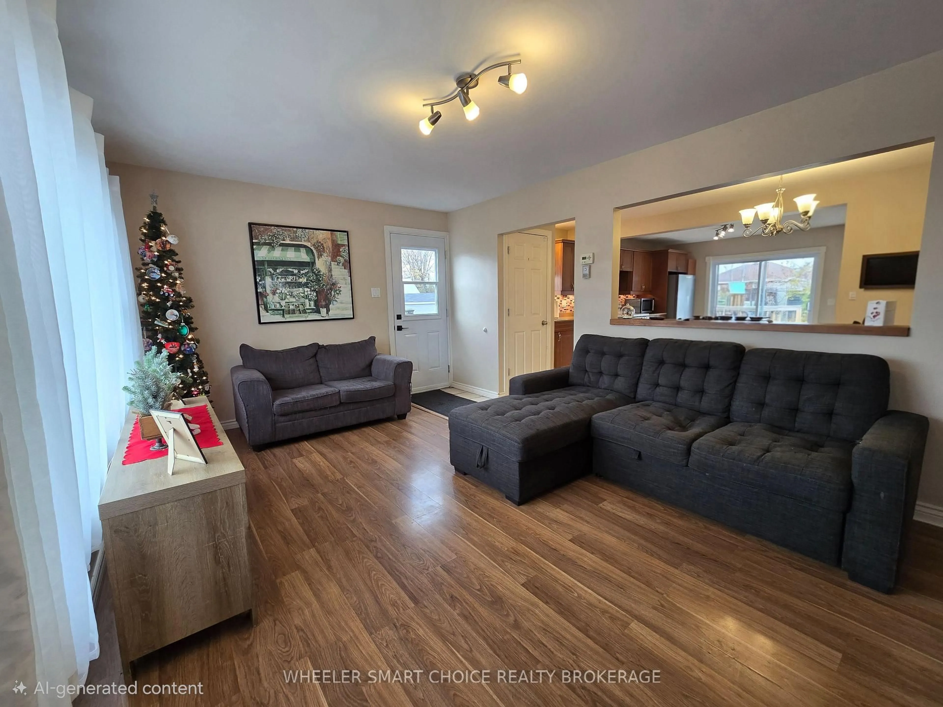 Living room with furniture, wood/laminate floor for 17 Adam Dixon Ave, South Stormont Ontario K0C 1P0