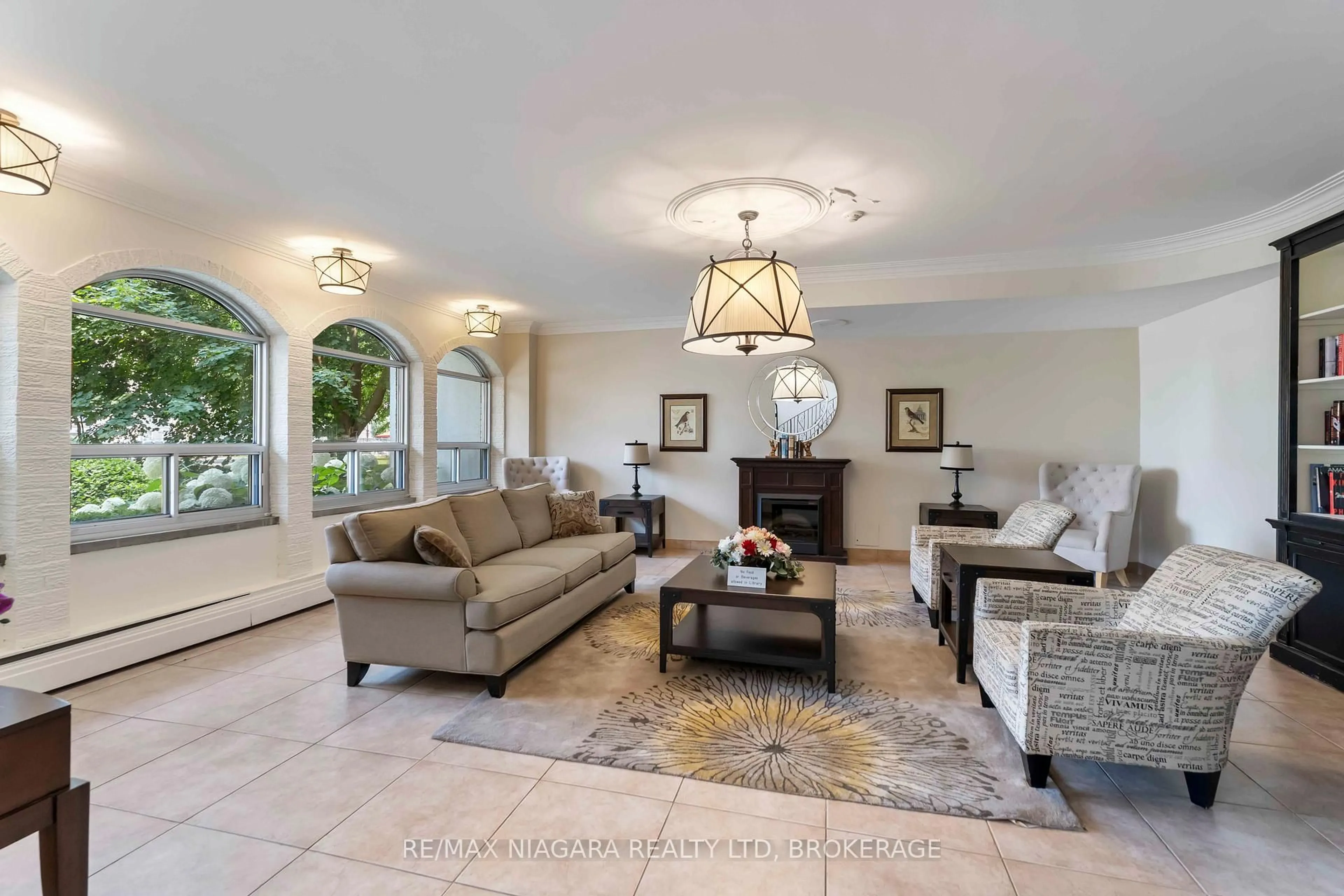 Living room with furniture, ceramic/tile floor for 365 Geneva St #602, St. Catharines Ontario L2N 5S7