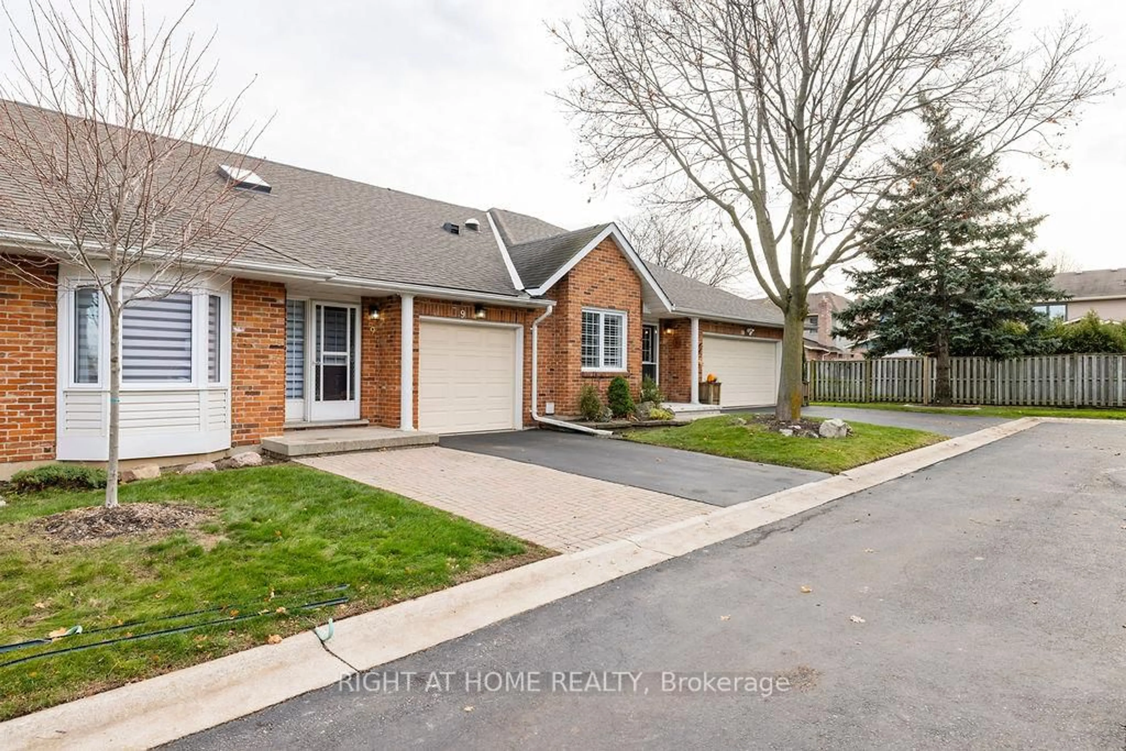 Home with brick exterior material, street for 810 Golf Links Rd #9, Hamilton Ontario L9K 1J7