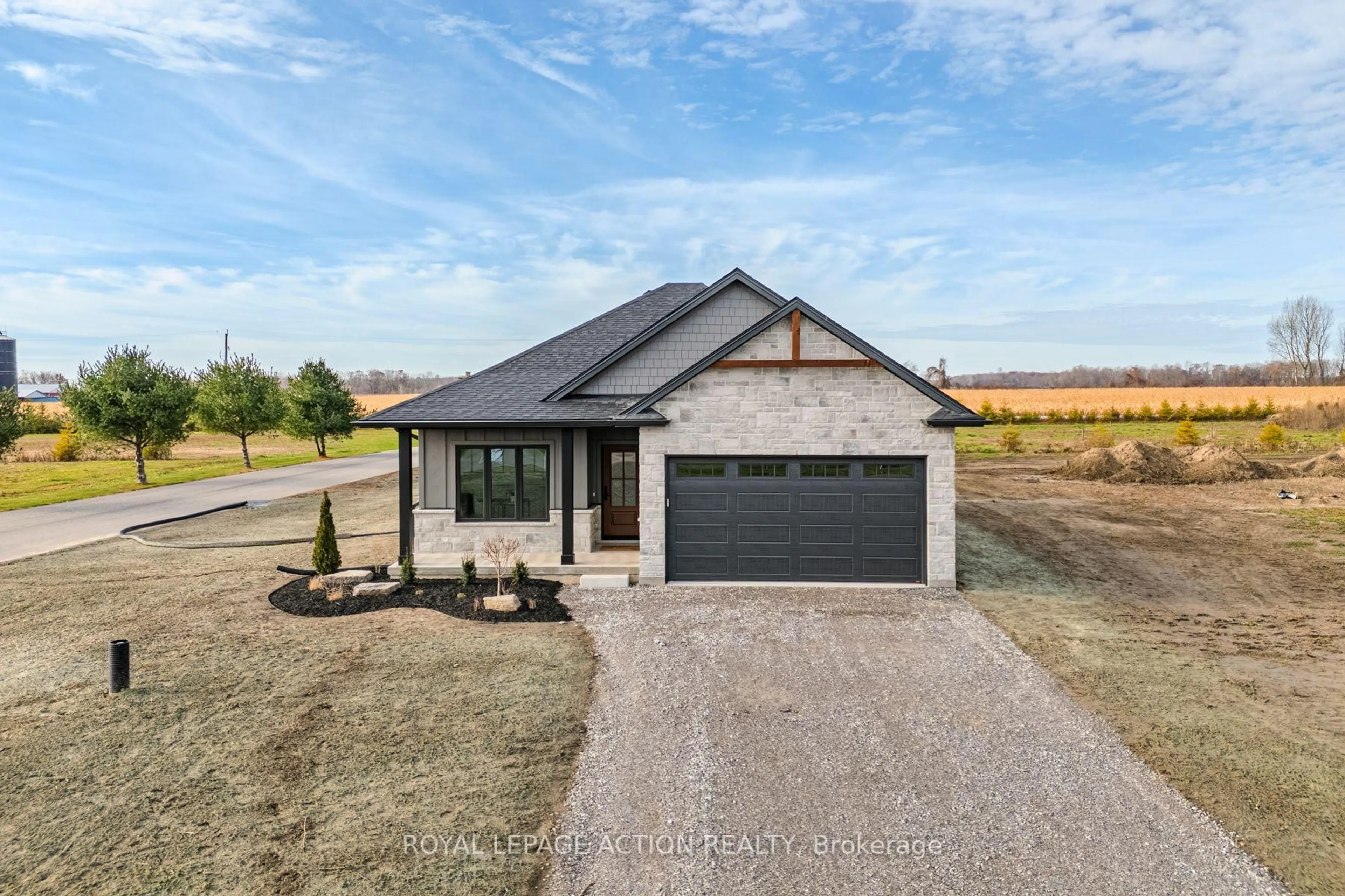 A pic from outside/outdoor area/front of a property/back of a property/a pic from drone, street for 51 Wild Rose Lane, Norfolk Ontario N0E 1P0