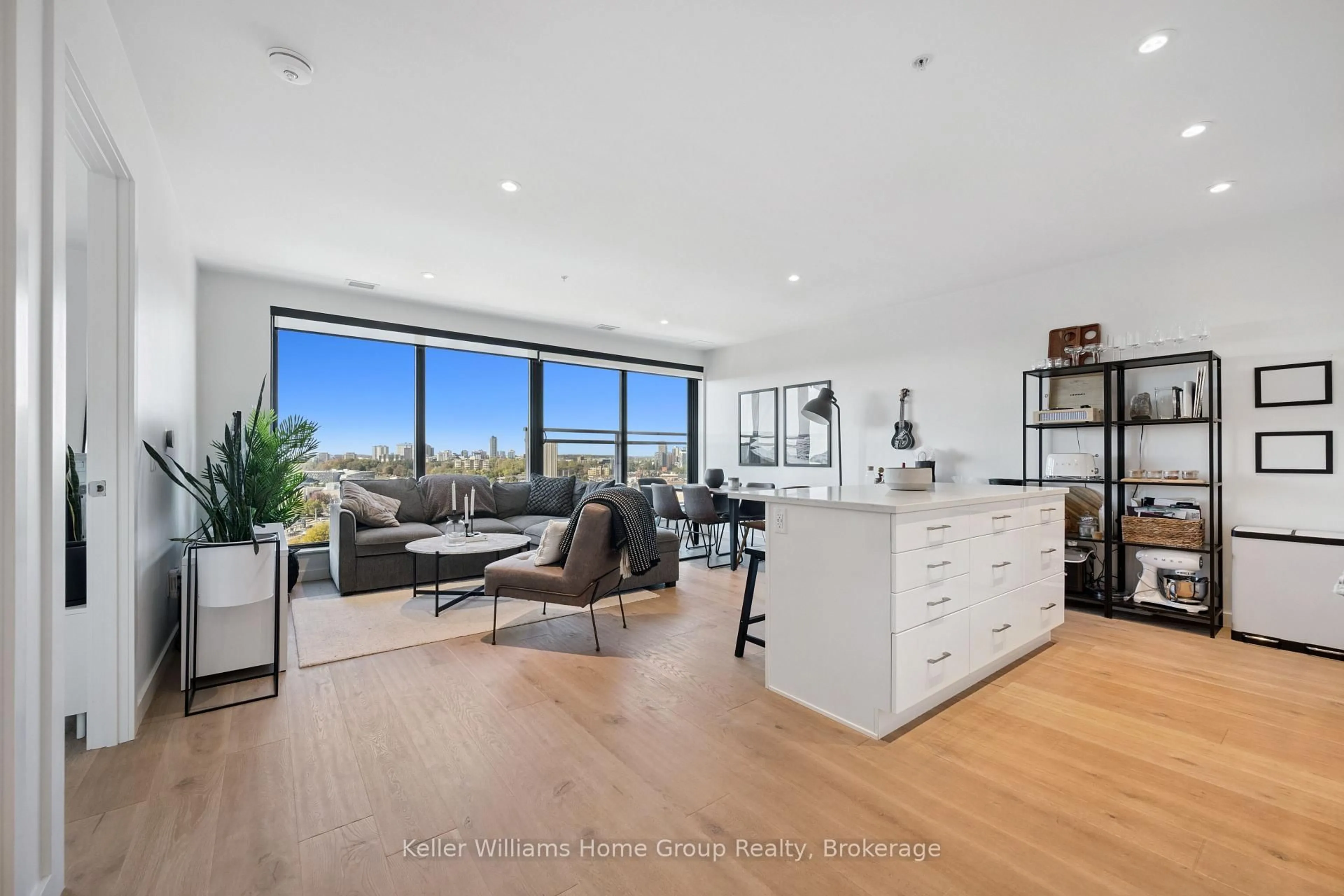 Living room with furniture, wood/laminate floor for 181 King St #1105, Waterloo Ontario N2J 0E7