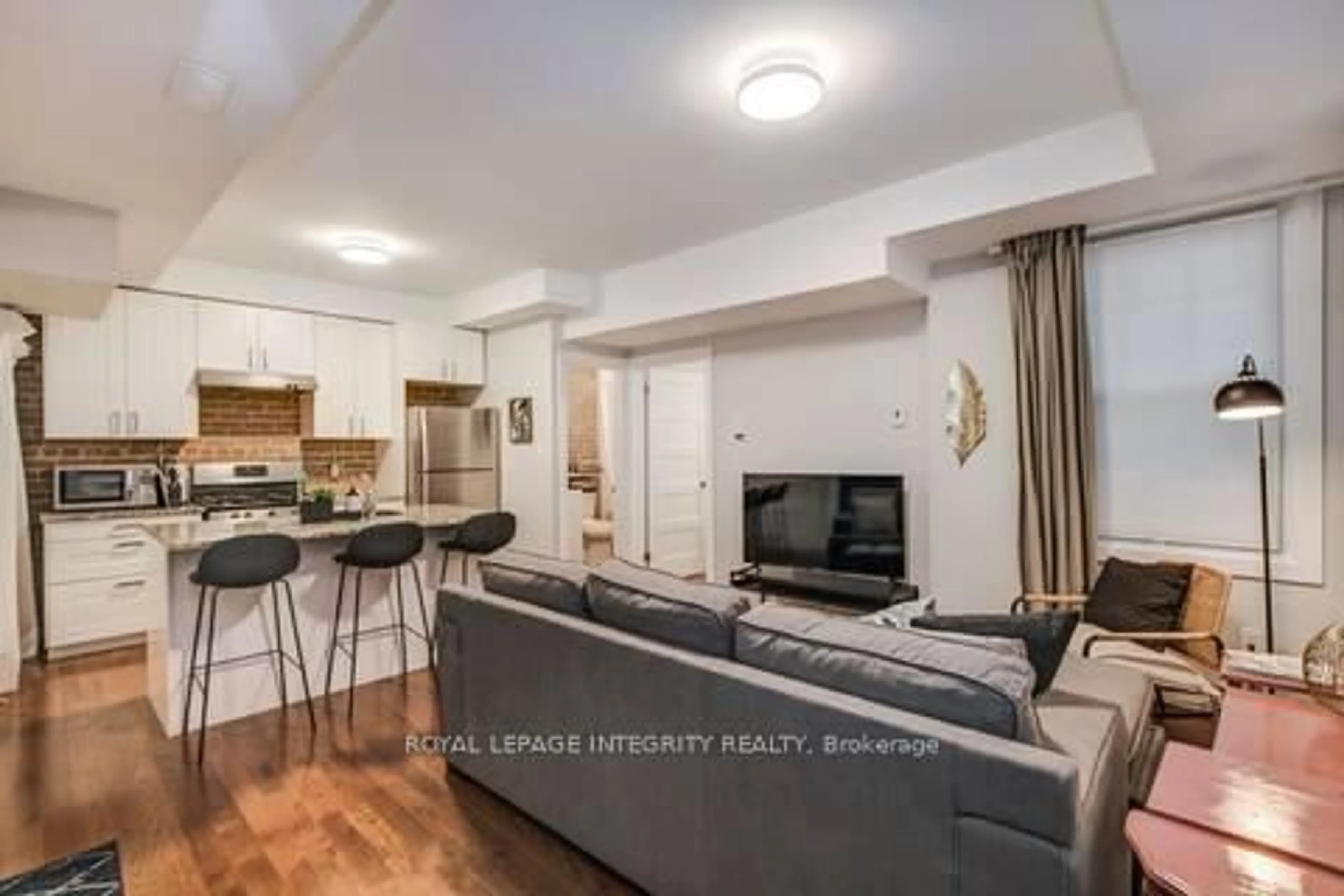 Living room with furniture, unknown for 222 Argyle Ave, Ottawa Ontario K2P 1B9