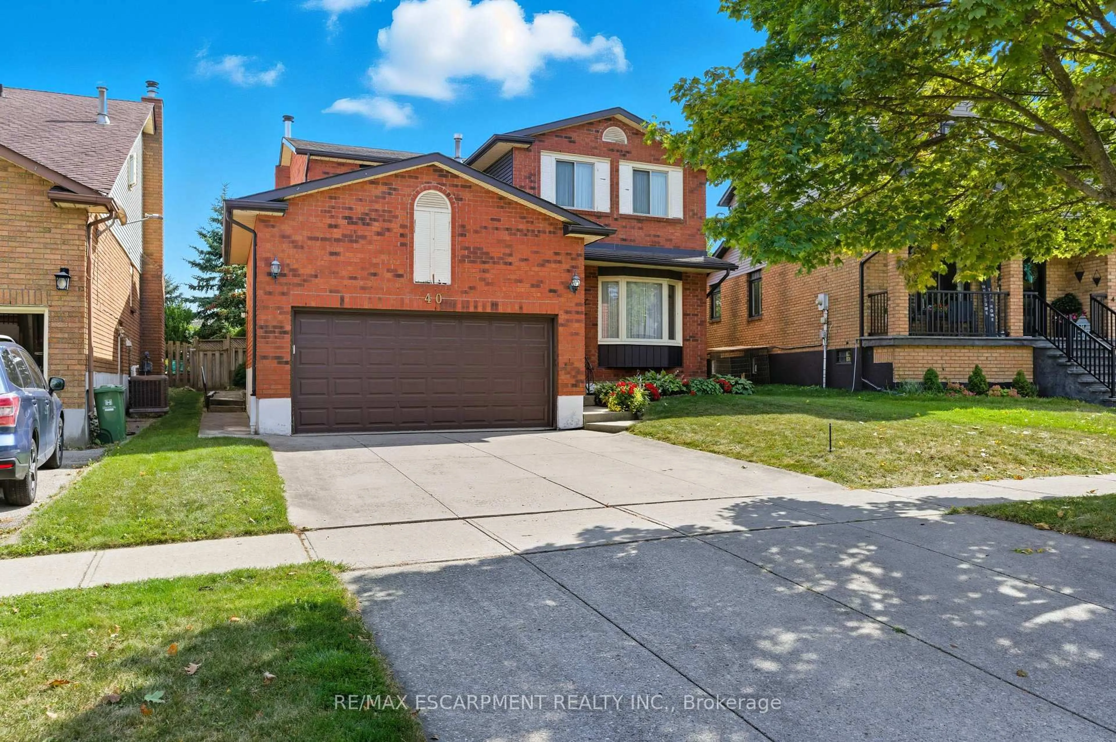 Home with brick exterior material, street for 40 Gatestone Dr, Hamilton Ontario L8J 2P4