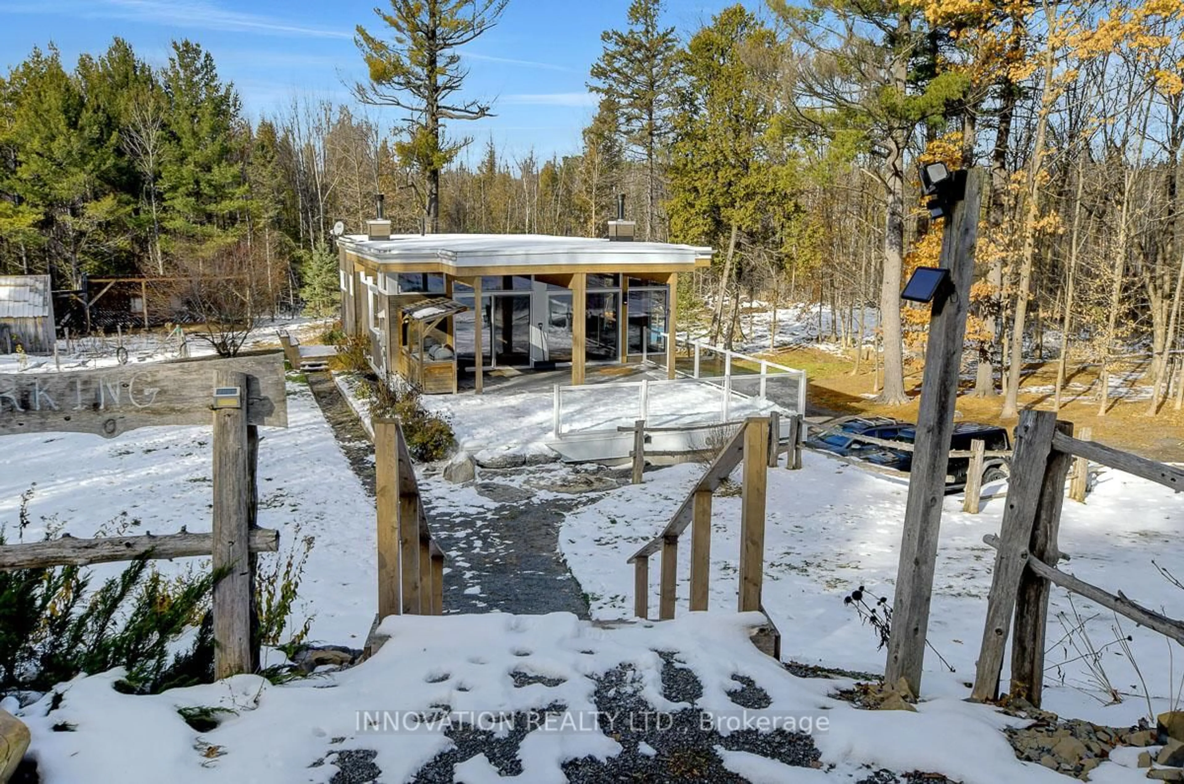 A pic from outside/outdoor area/front of a property/back of a property/a pic from drone, forest/trees view for 1792 Bearhill Rd, Carp Ontario K0A 1L0