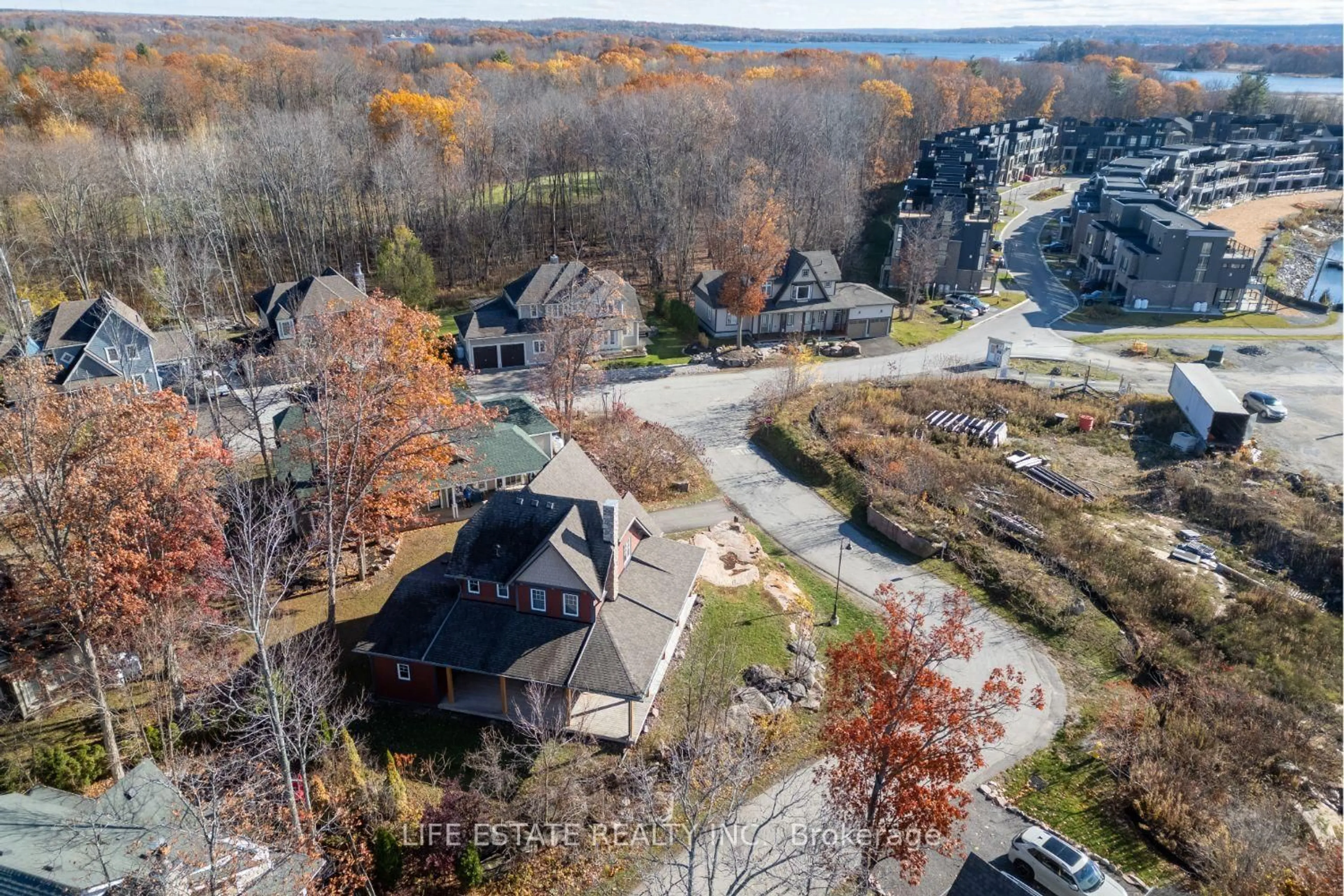 A pic from outside/outdoor area/front of a property/back of a property/a pic from drone, unknown for 39 Country Tr #20, Georgian Bay Ontario L0K 1S0