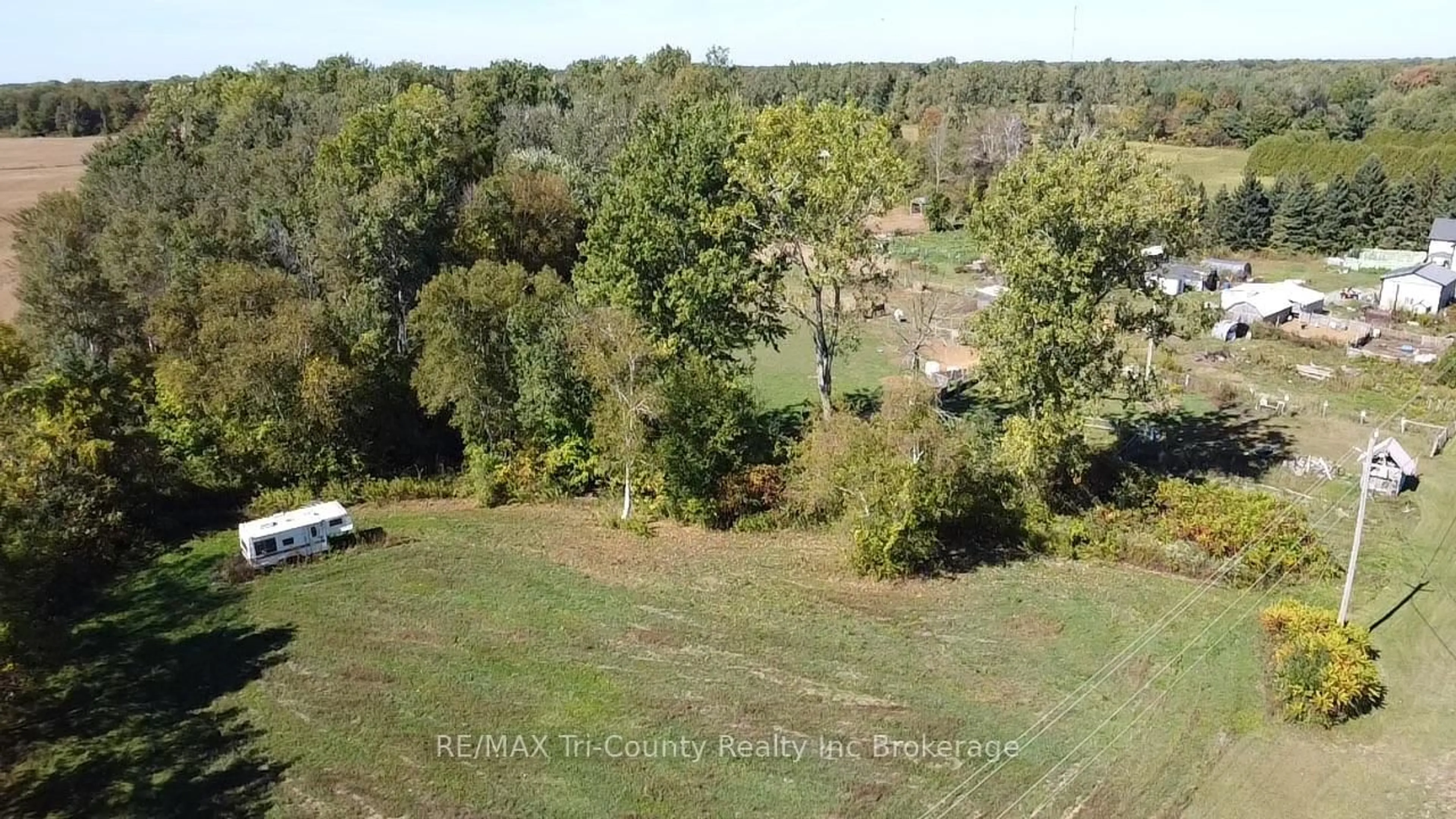 A pic from outside/outdoor area/front of a property/back of a property/a pic from drone, forest/trees view for 853 Norfolk County 28 Rd, Norfolk Ontario N0E 1G0