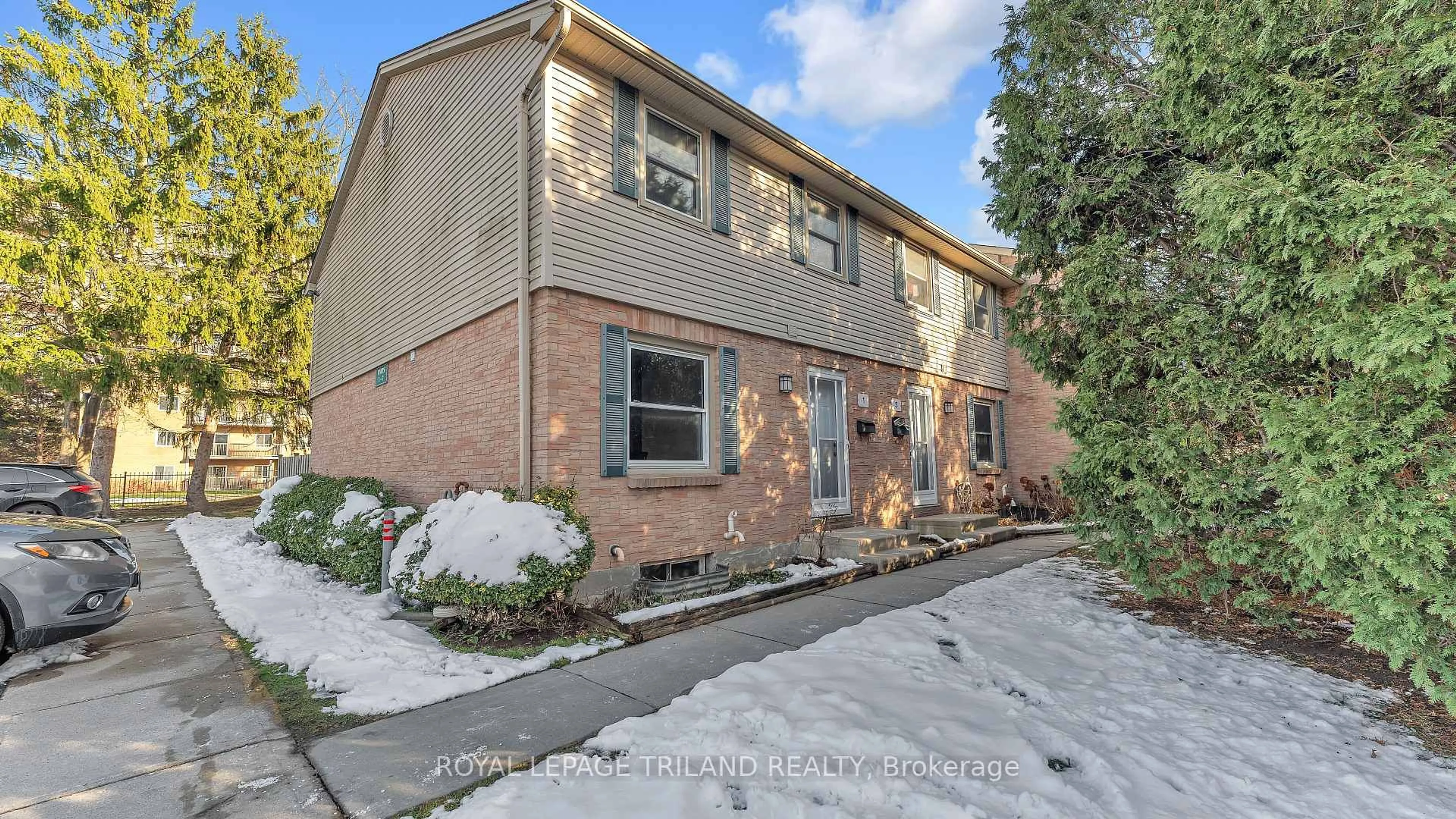 Home with brick exterior material, street for 1247 Huron St #1, London East Ontario N5Y 4X7