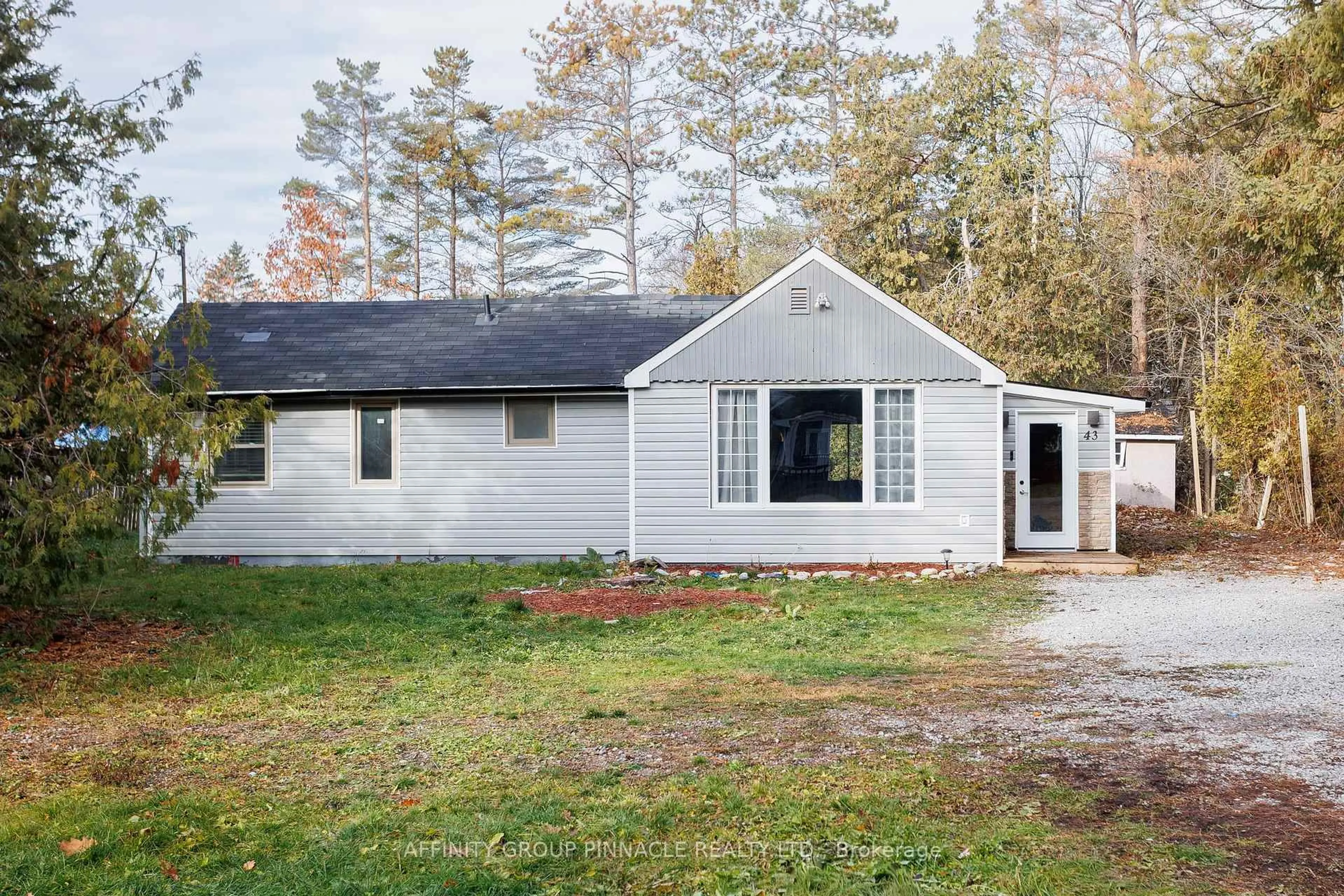 Home with vinyl exterior material, street for 43 Parkhill Dr, Kawartha Lakes Ontario K0M 1N0