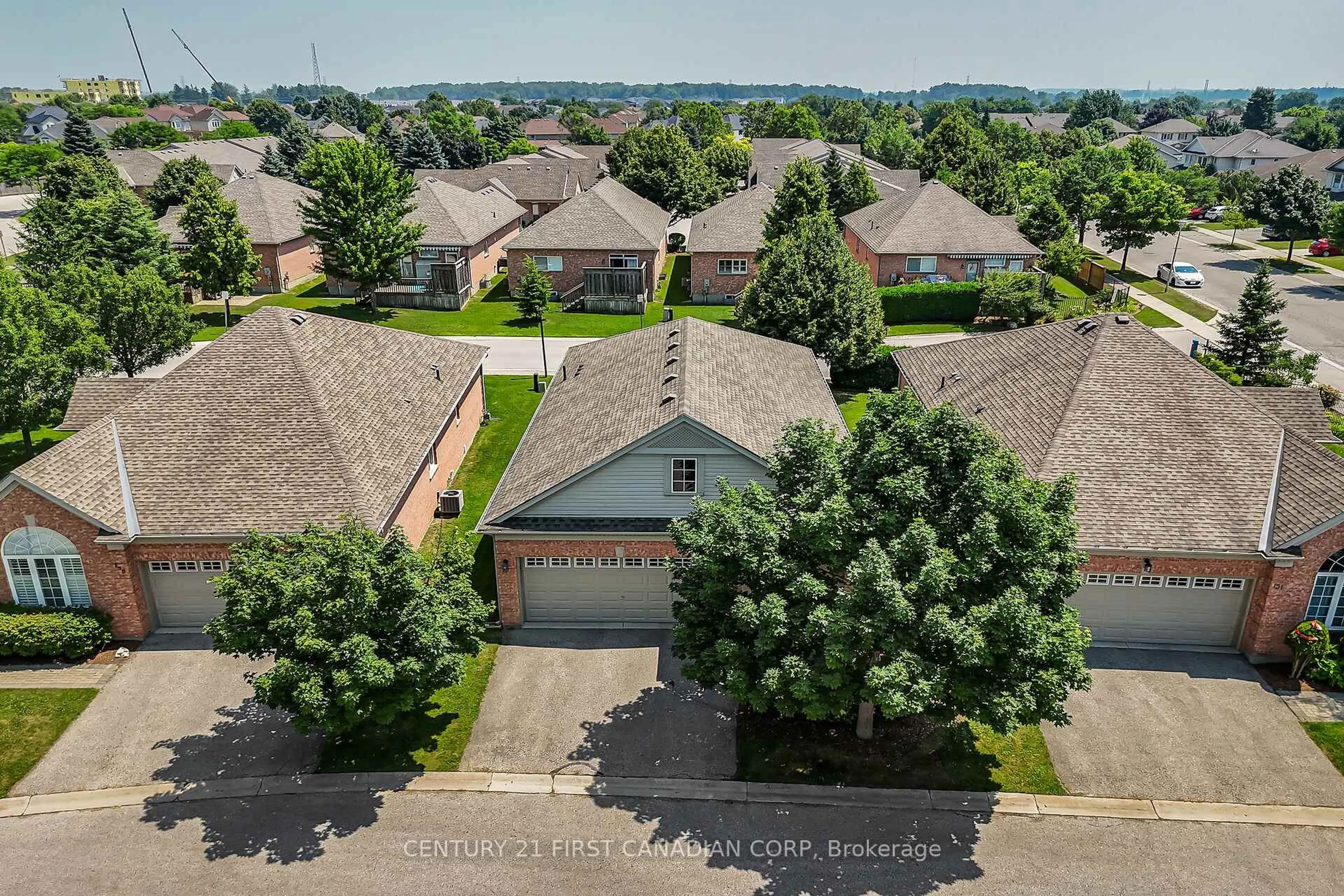 A pic from outside/outdoor area/front of a property/back of a property/a pic from drone, street for 2025 Meadowgate Blvd #153, London South Ontario N6M 1K9