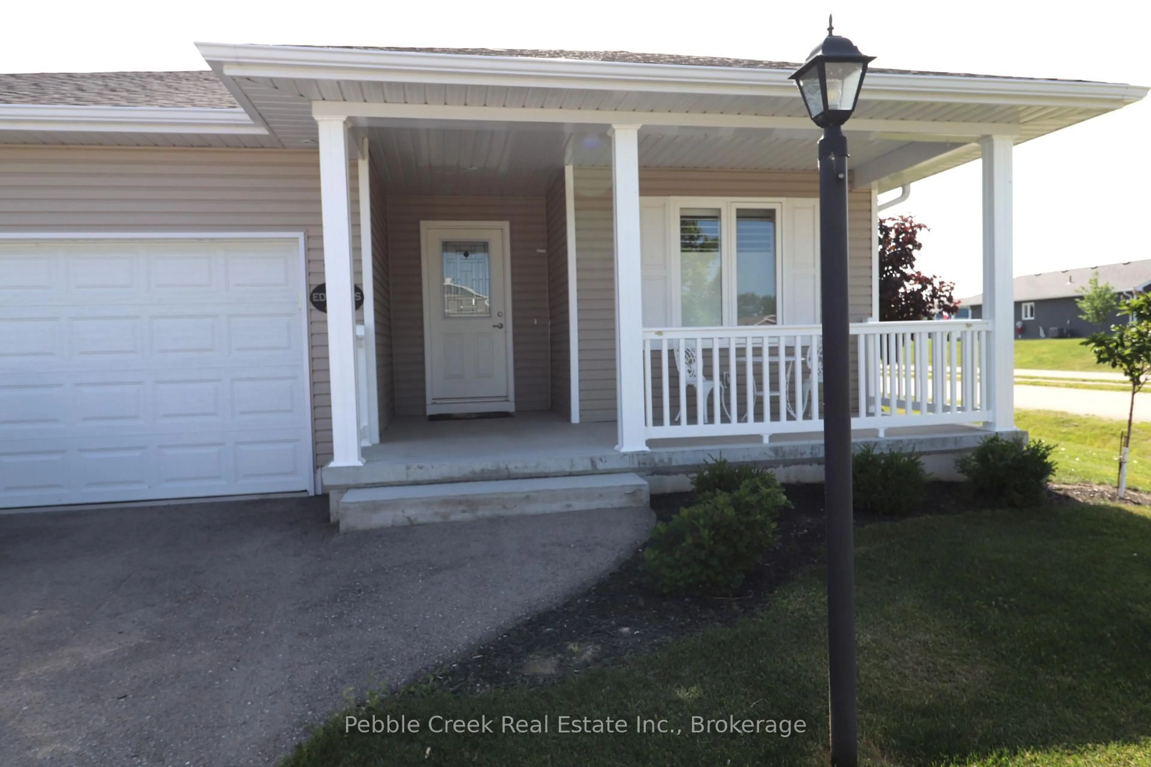 Home with vinyl exterior material, street for 18 Windward Way, Ashfield-Colborne-Wawanosh Ontario N7A 0B2