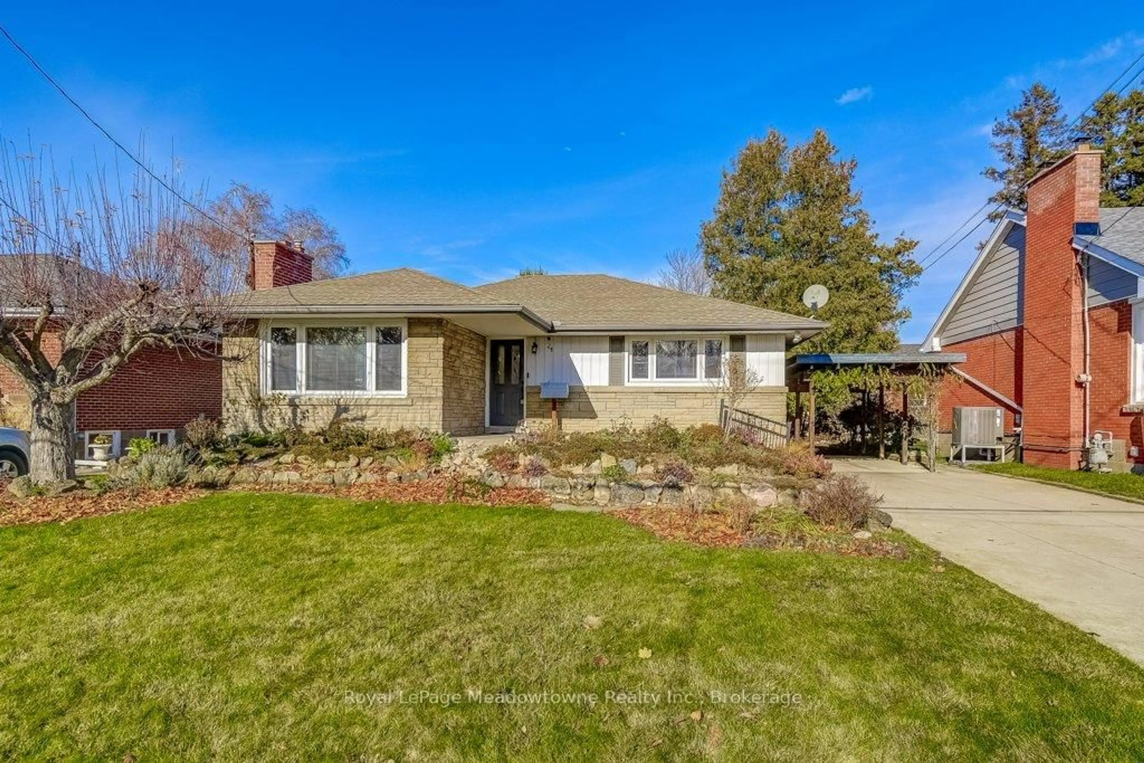 Home with brick exterior material, street for 24 McMaster Ave, Hamilton Ontario L9H 4M7