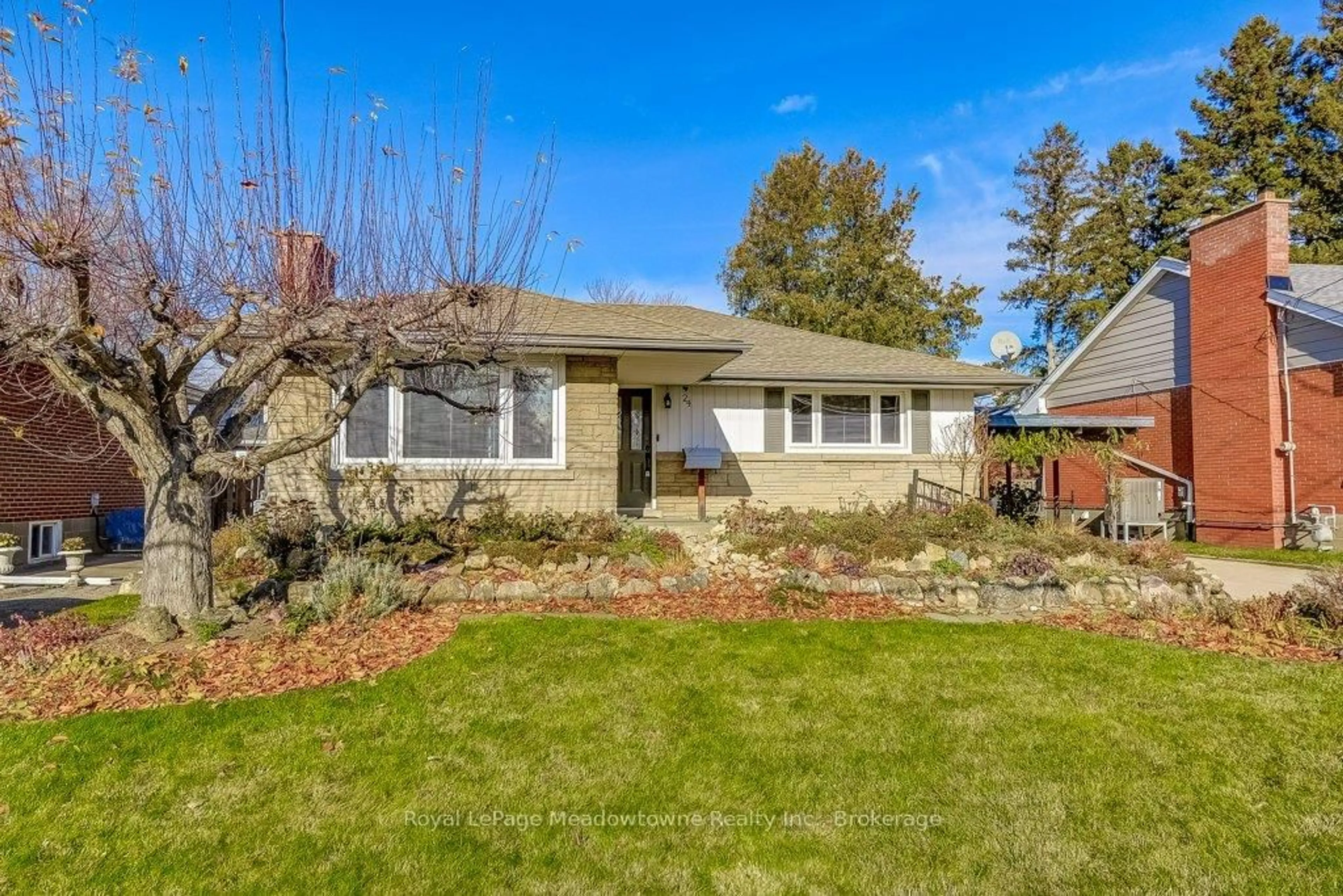 Home with brick exterior material, street for 24 McMaster Ave, Hamilton Ontario L9H 4M7