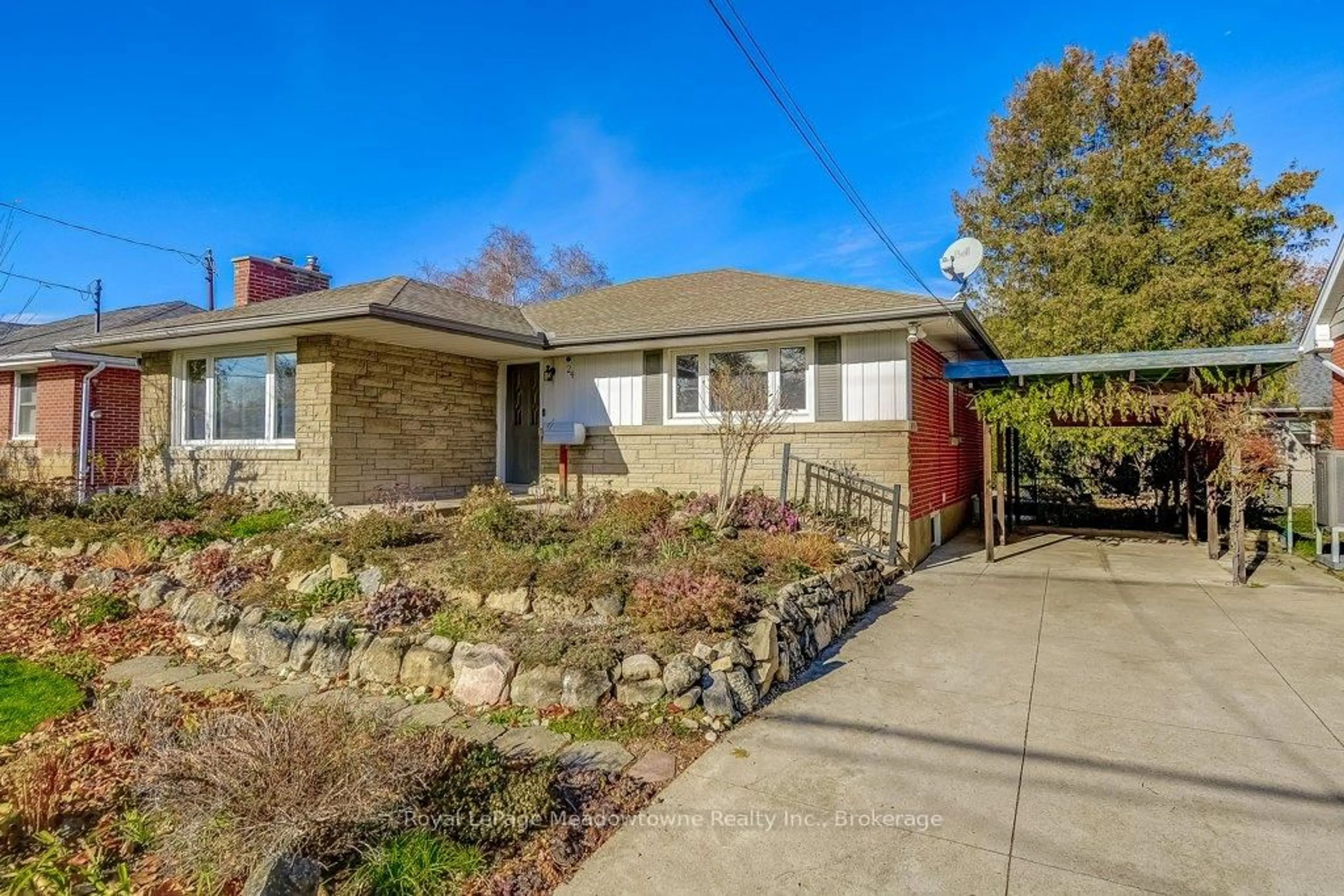 Home with brick exterior material, street for 24 McMaster Ave, Hamilton Ontario L9H 4M7