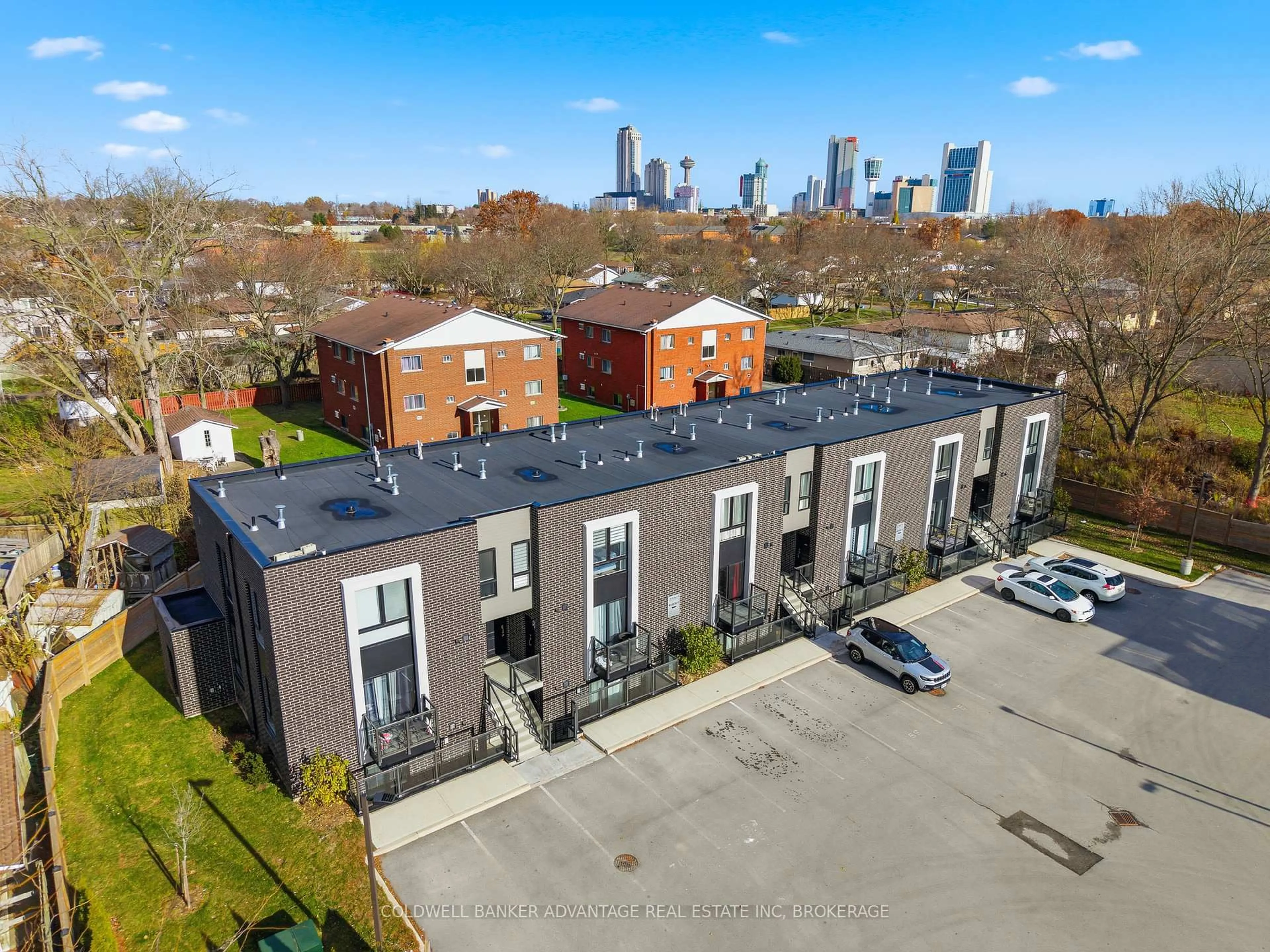 A pic from outside/outdoor area/front of a property/back of a property/a pic from drone, city buildings view from balcony for 6065 McLeod Rd #103, Niagara Falls Ontario L2G 0Z7
