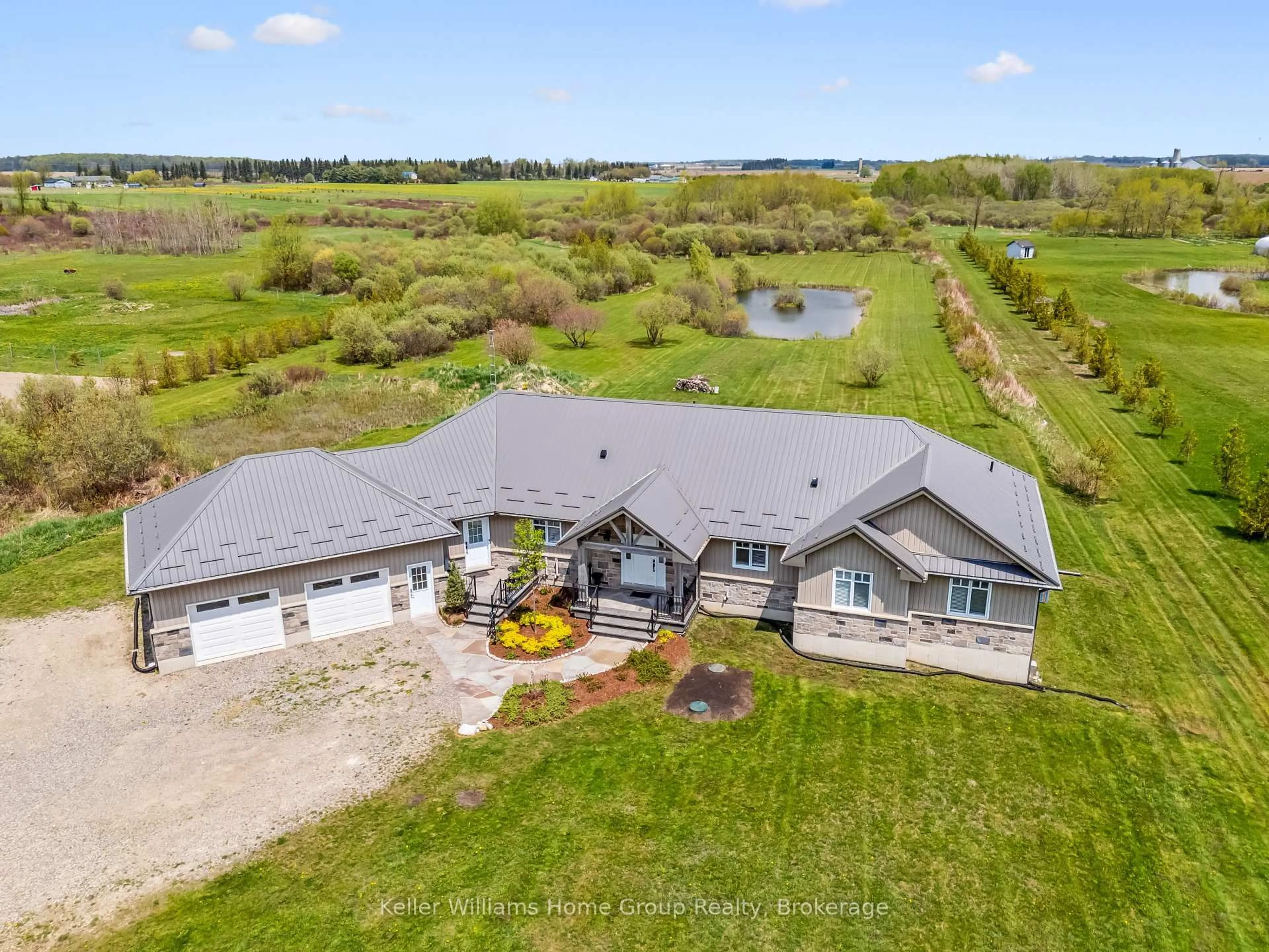 A pic from outside/outdoor area/front of a property/back of a property/a pic from drone, water/lake/river/ocean view for 7303 Fifth Line, Wellington North Ontario N0B 1J0