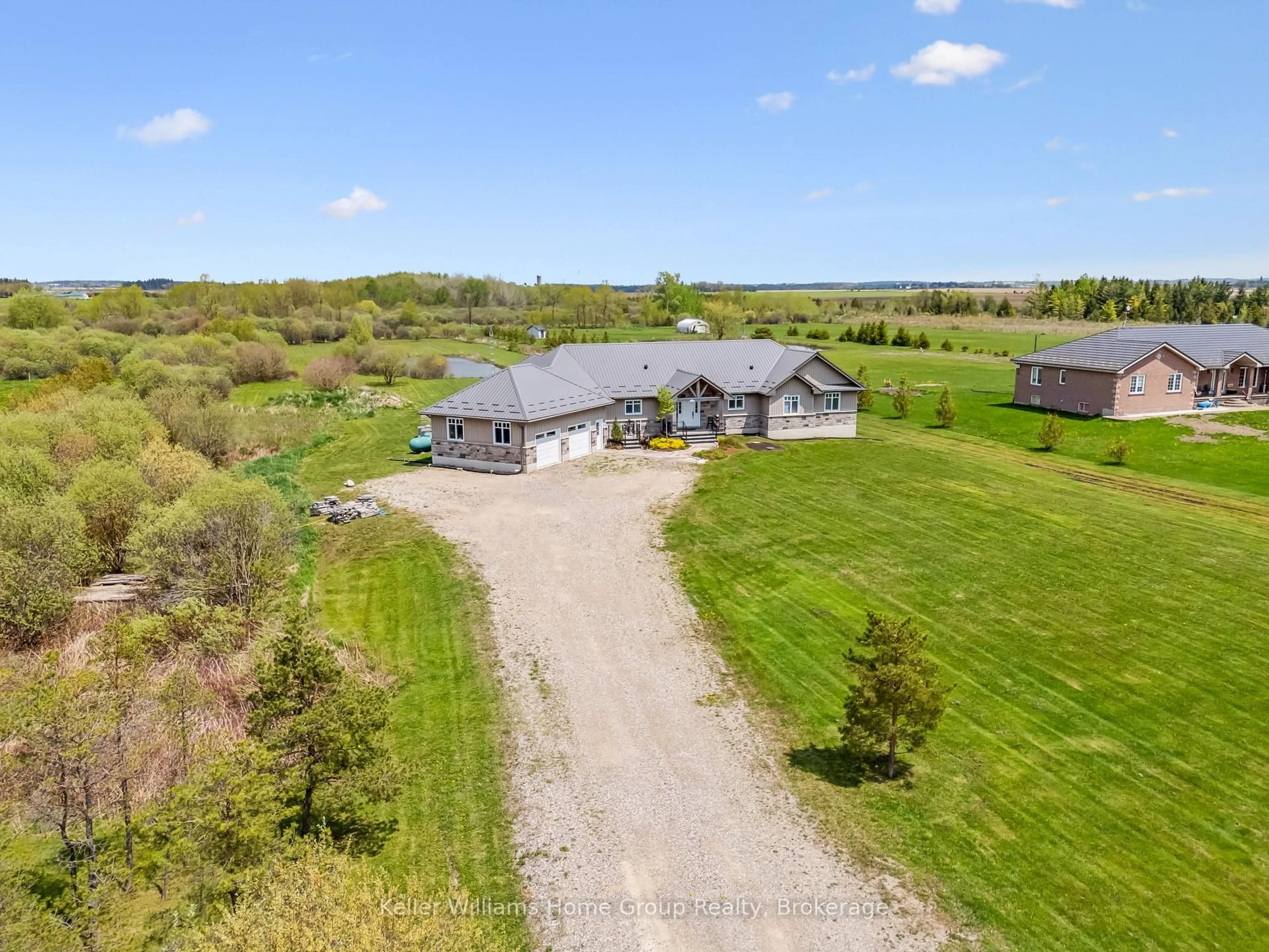 A pic from outside/outdoor area/front of a property/back of a property/a pic from drone, water/lake/river/ocean view for 7303 Fifth Line, Wellington North Ontario N0B 1J0