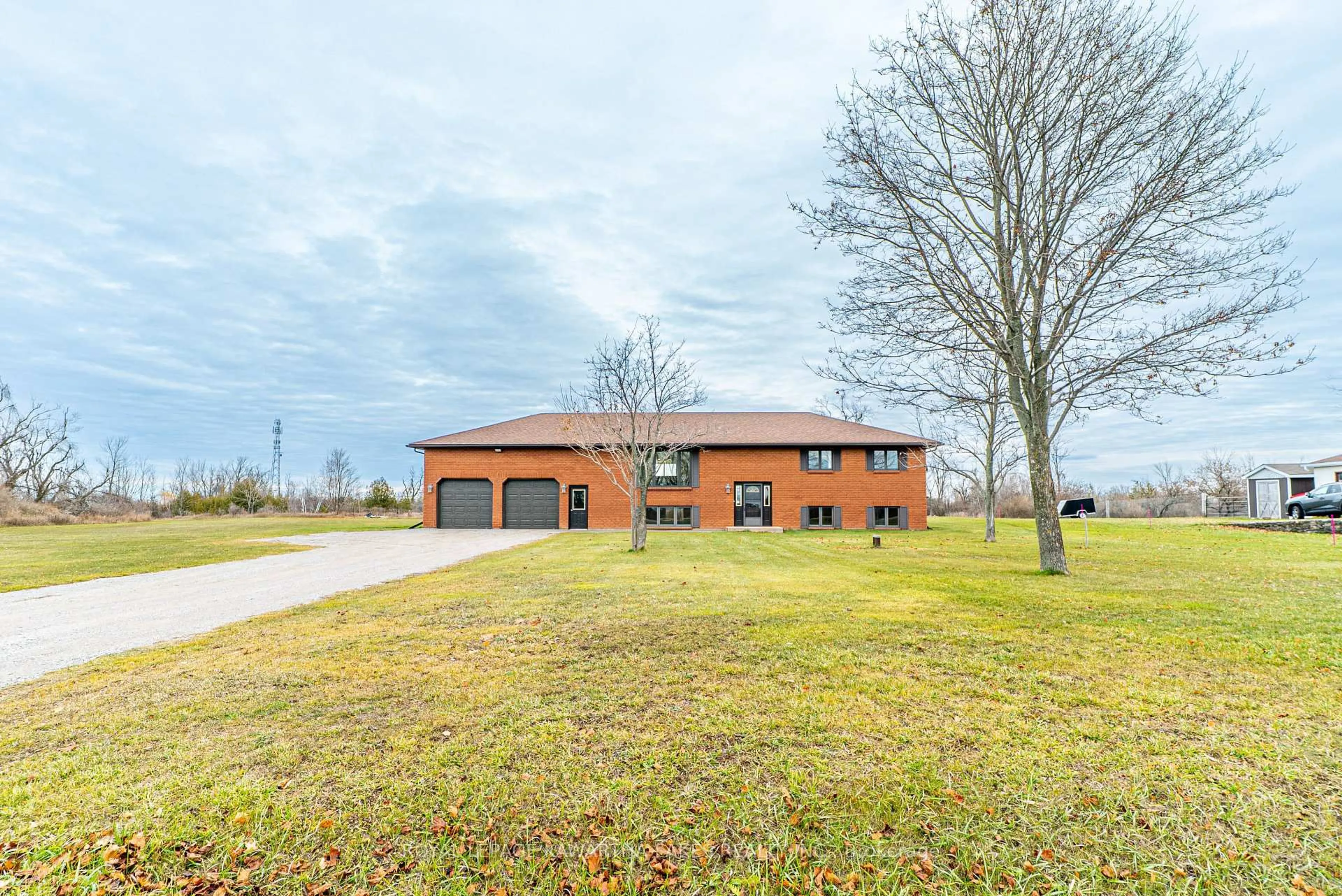 Home with brick exterior material, unknown for 4170 Hwy 35, Kawartha Lakes Ontario K0M 1G0