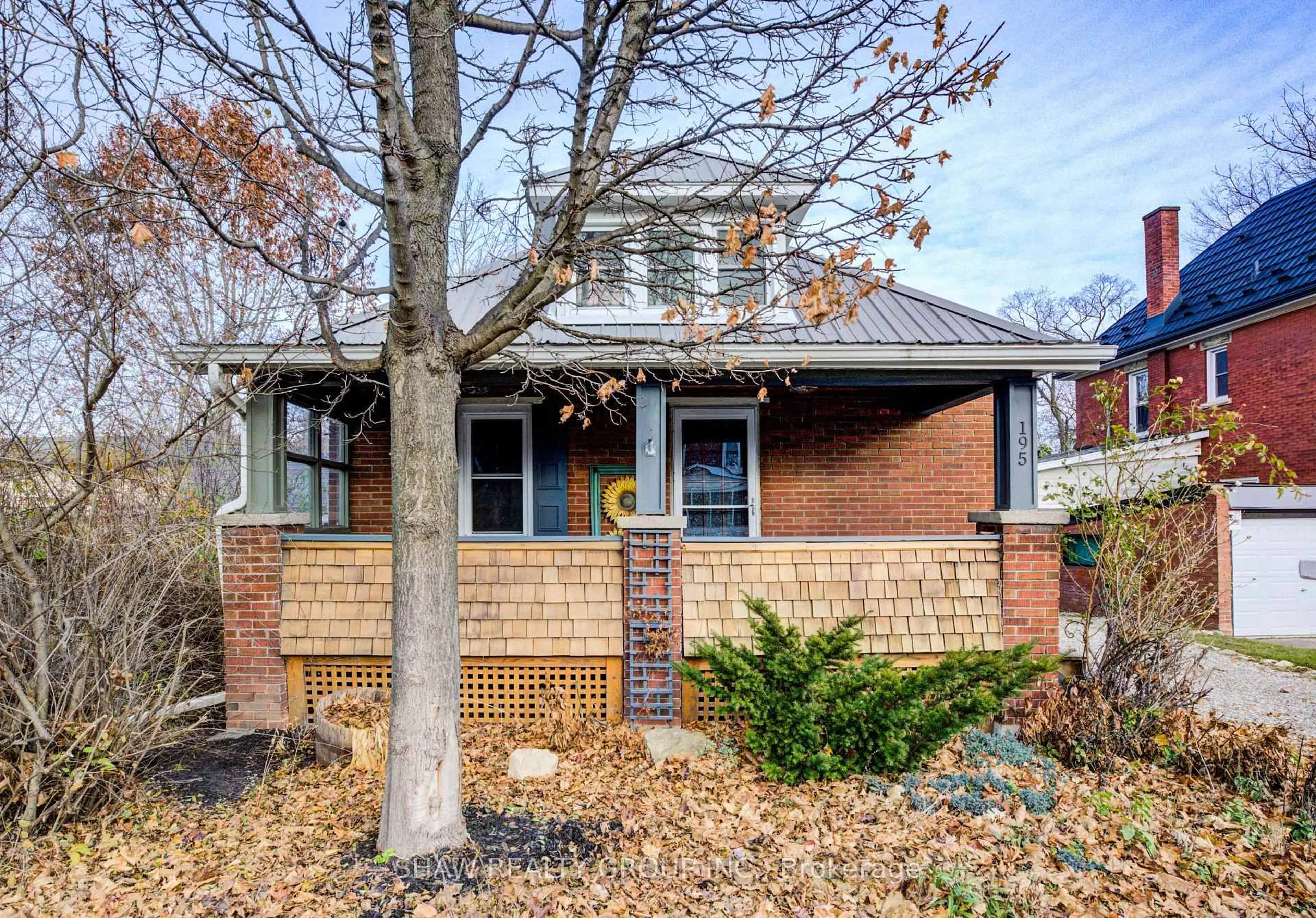 Home with brick exterior material, street for 195 Edinburgh Rd, Guelph Ontario N1H 5R8