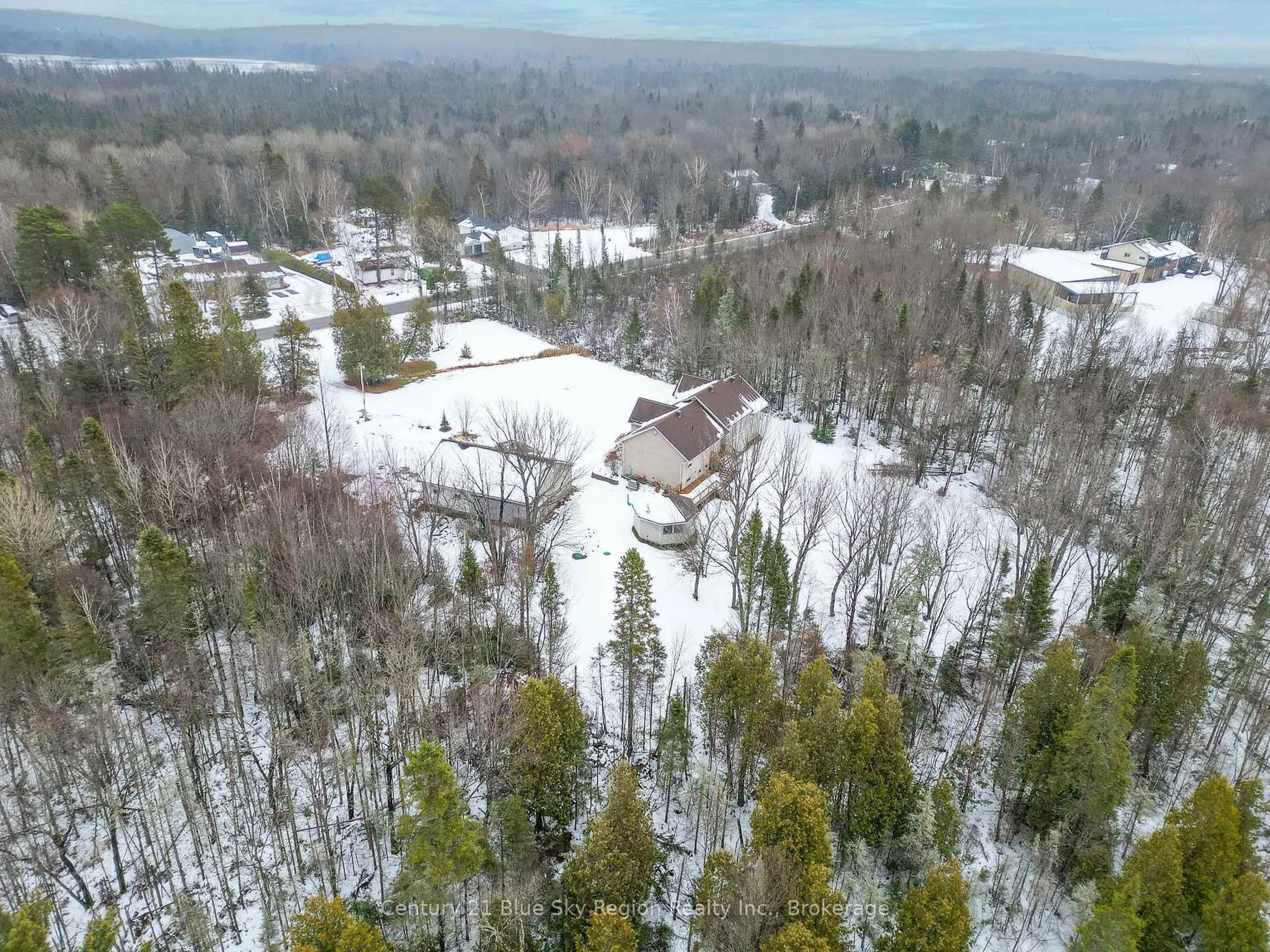 A pic from outside/outdoor area/front of a property/back of a property/a pic from drone, forest/trees view for 45 Chadbourne Dr, North Bay Ontario P1B 8G2