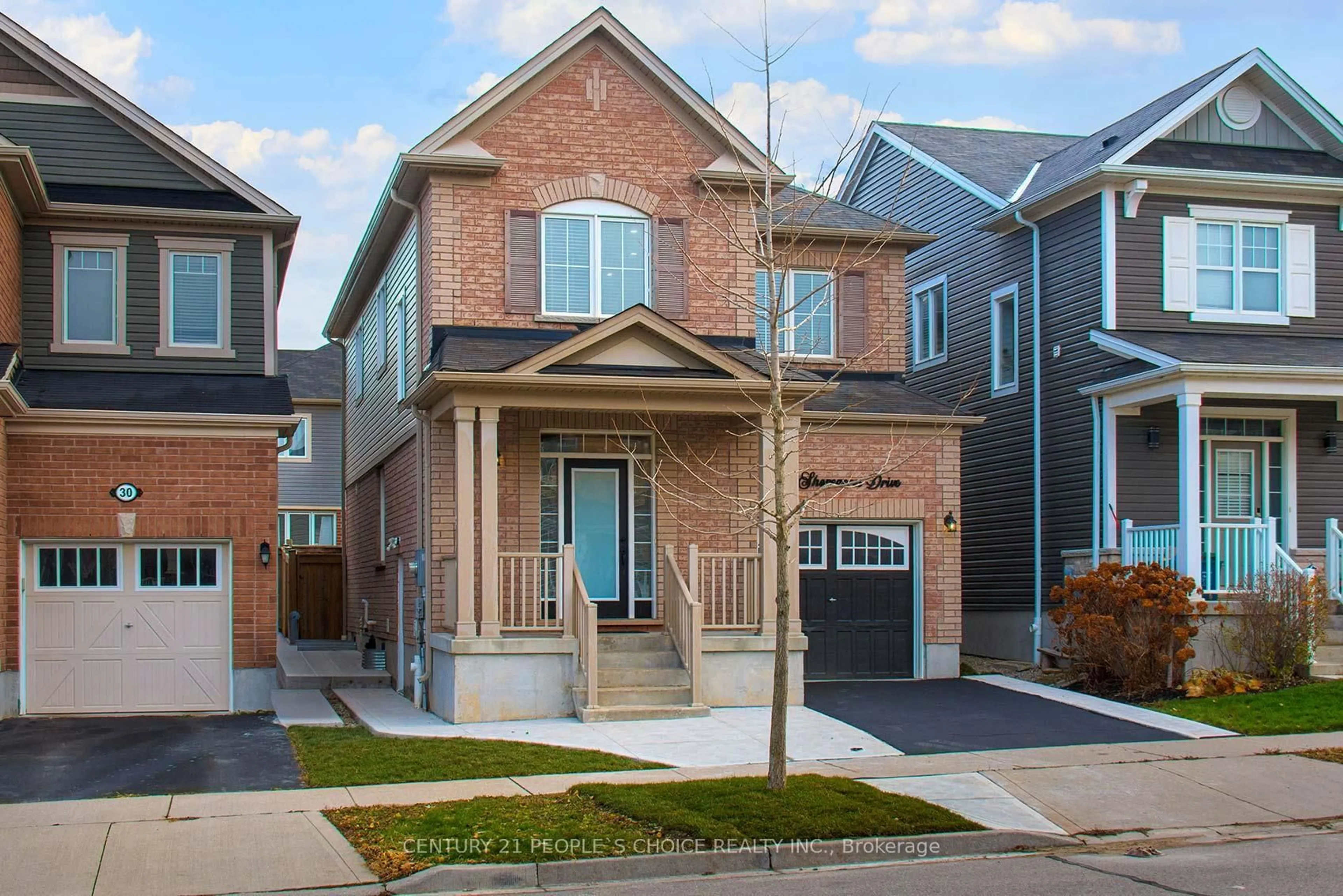 Home with brick exterior material, street for 26 Shoreacres Dr, Kitchener Ontario N2R 0K7