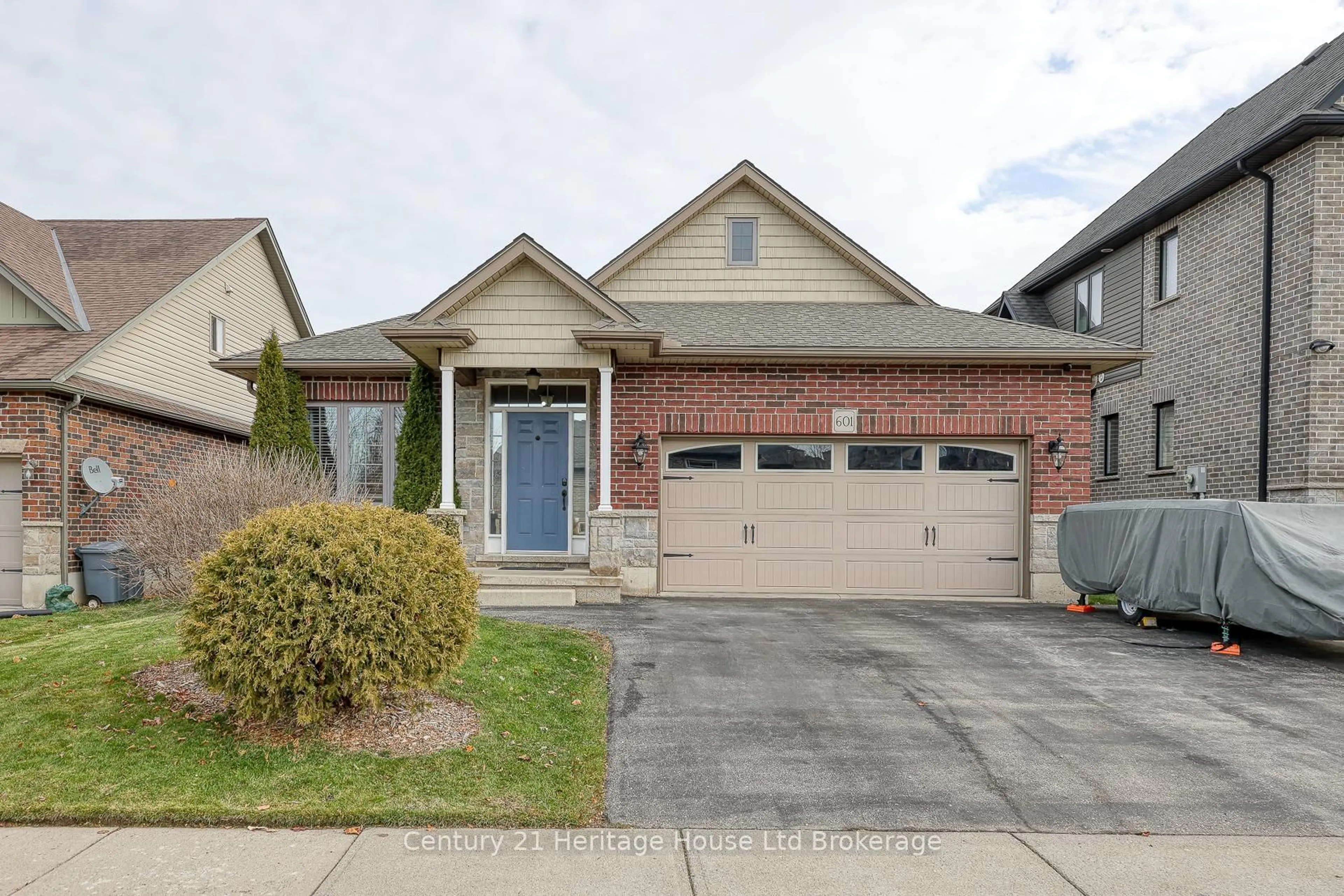 Home with brick exterior material, street for 601 Sales Dr, Woodstock Ontario N4S 0A1