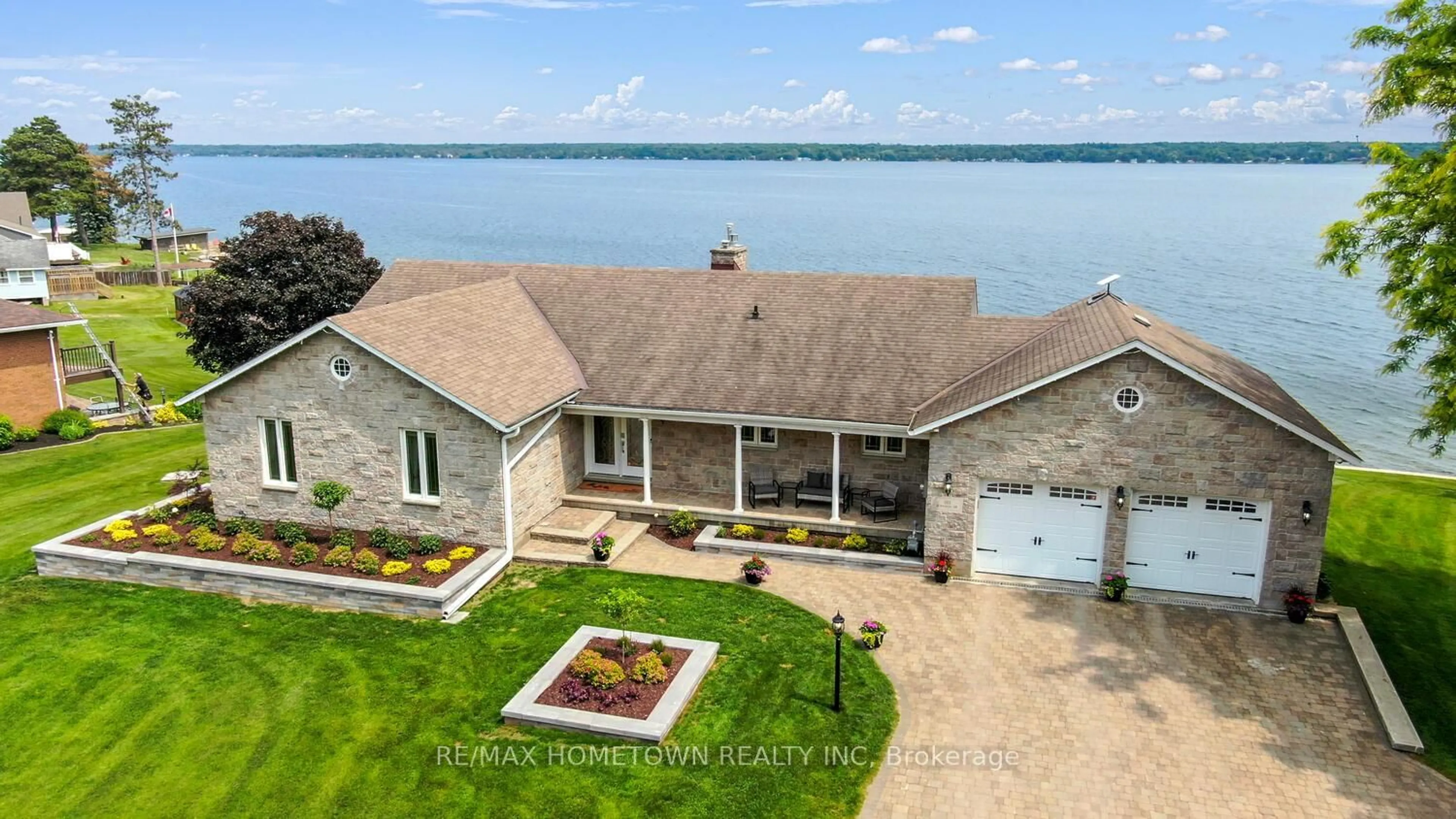 A pic from outside/outdoor area/front of a property/back of a property/a pic from drone, water/lake/river/ocean view for 1111 Burnside Dr, Augusta Ontario K6V 5T1